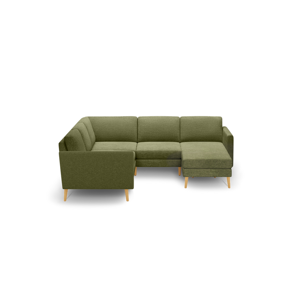 Green fabric L-shaped sectional sofa with wooden legs, featuring a left armrest and right chaise lounge for comfortable seating.