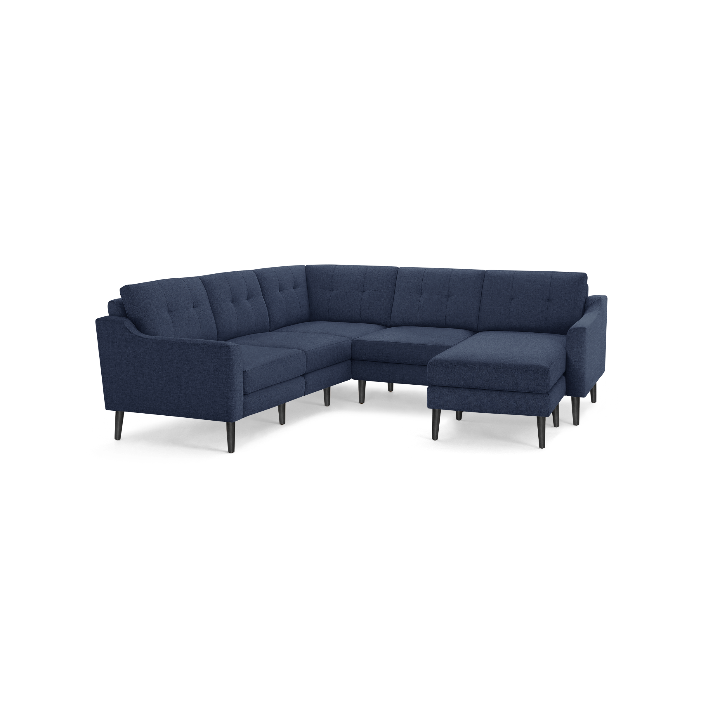 Modern L-shaped sectional sofa in dark blue fabric with tufted back cushions and slender black legs.