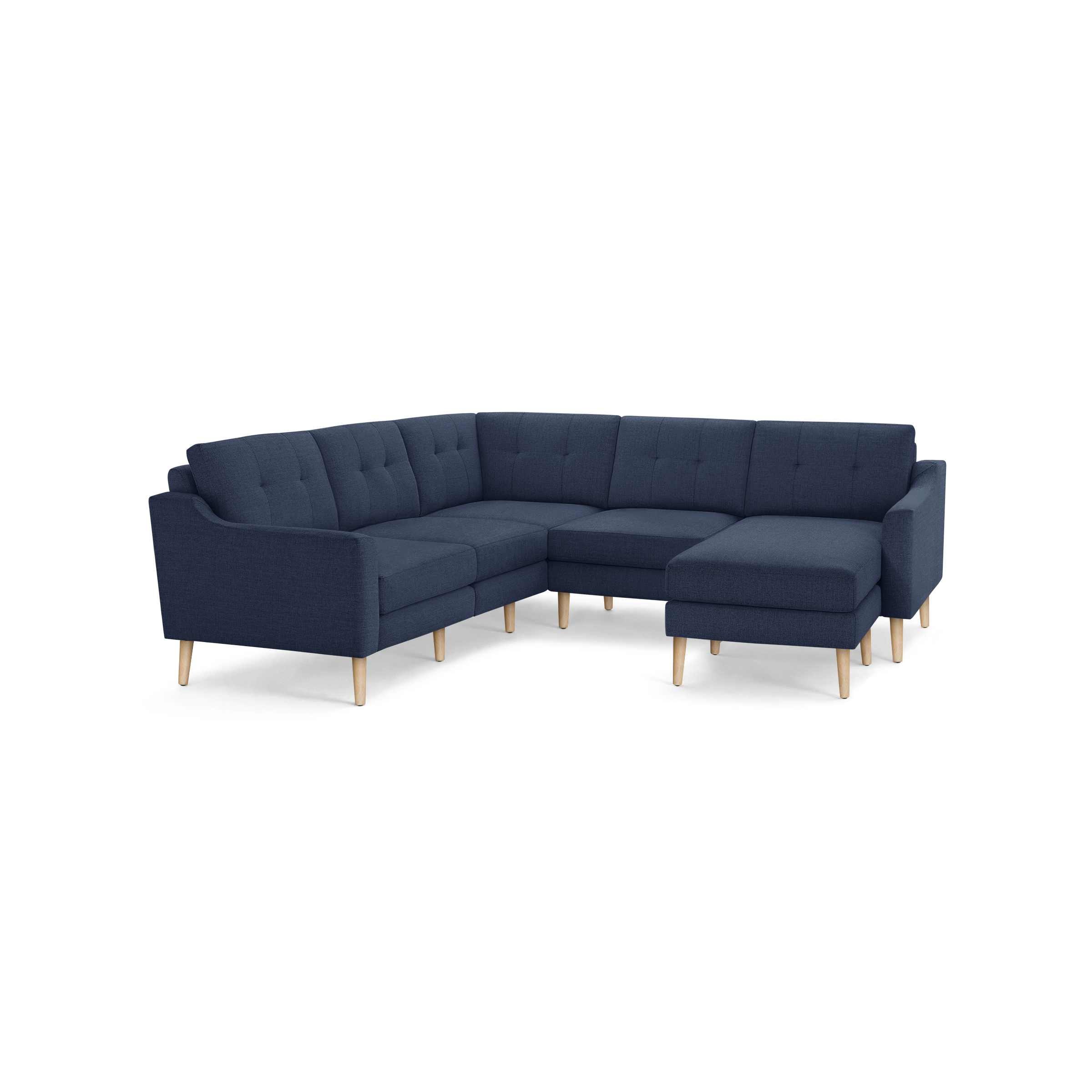 Modern L-shaped navy blue fabric sectional sofa with tufted back cushions and light wooden legs, designed for spacious seating.
