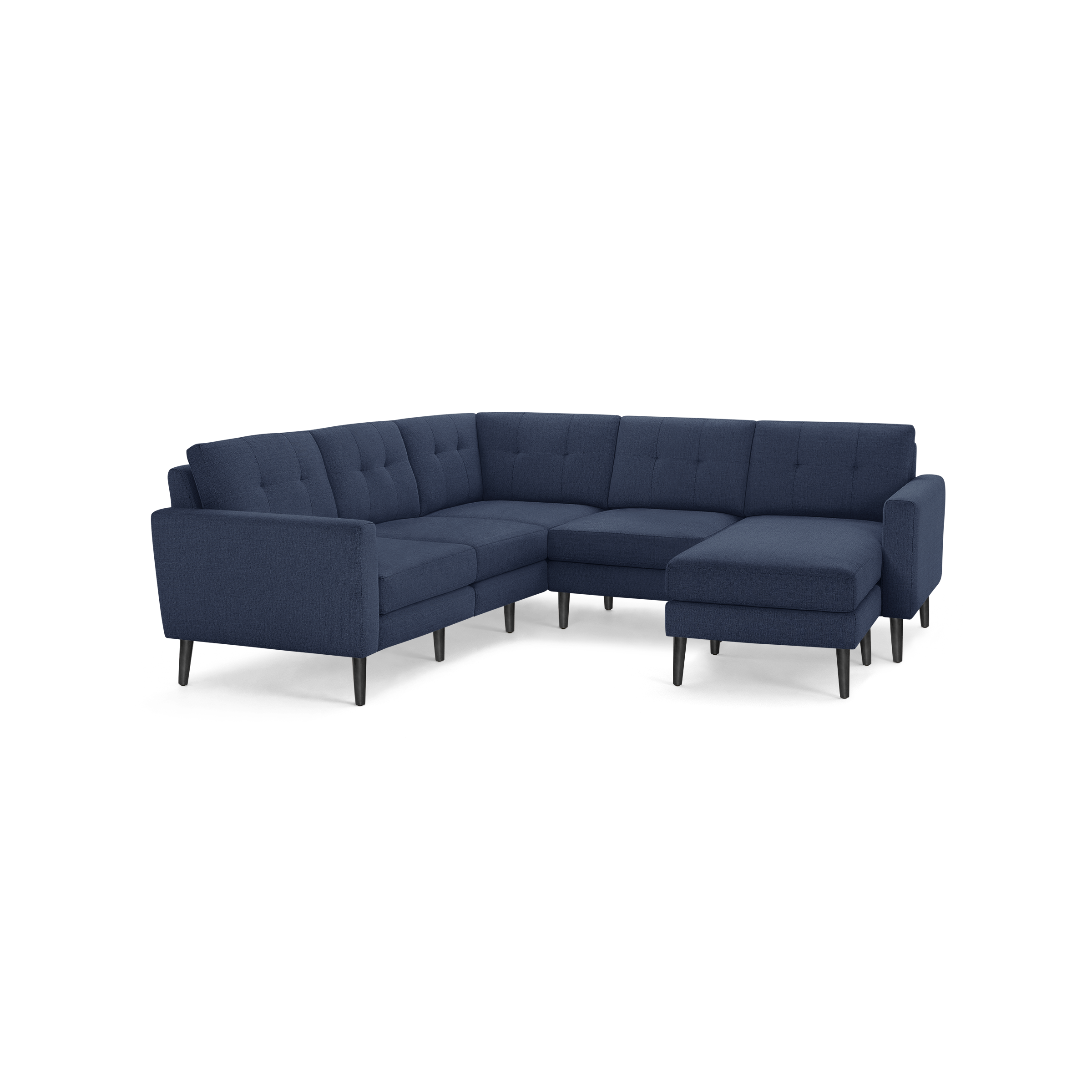 Modern L-shaped sectional sofa with navy blue tufted fabric upholstery and black tapered wooden legs.