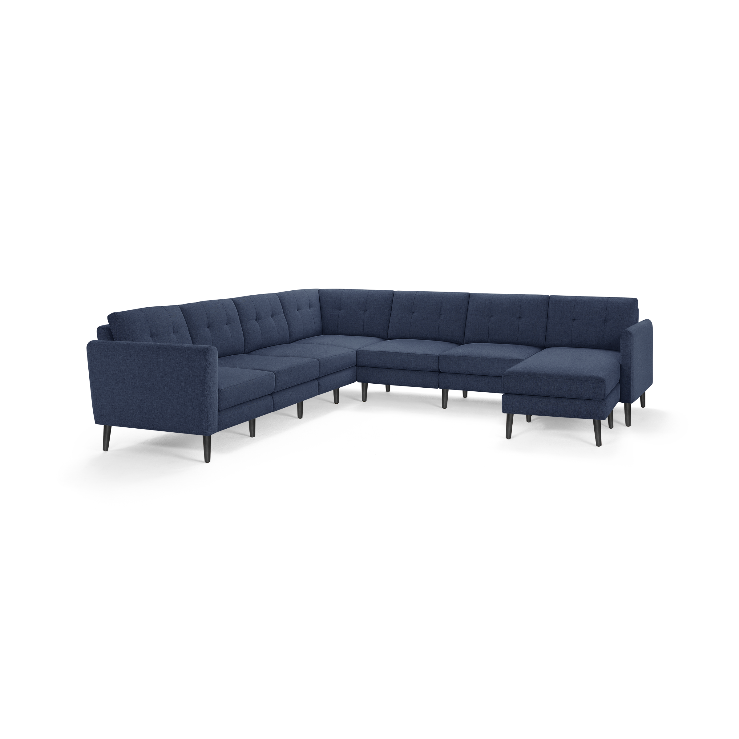 Large navy blue L-shaped sectional sofa with tufted cushions, straight armrests, and slim black tapered legs.