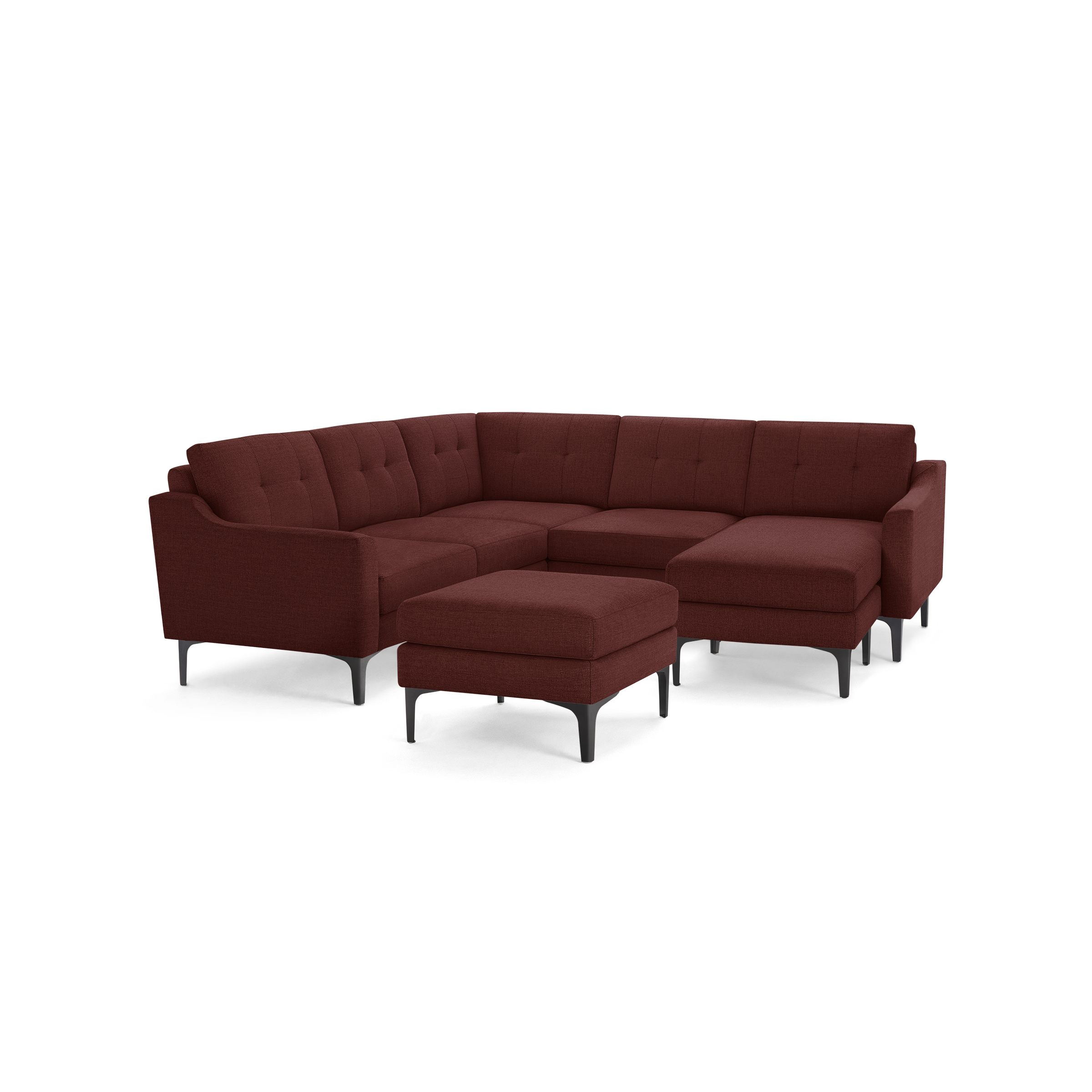 Modern sectional sofa in deep red fabric with tufted cushions, metal legs, and matching ottoman, designed for spacious seating.