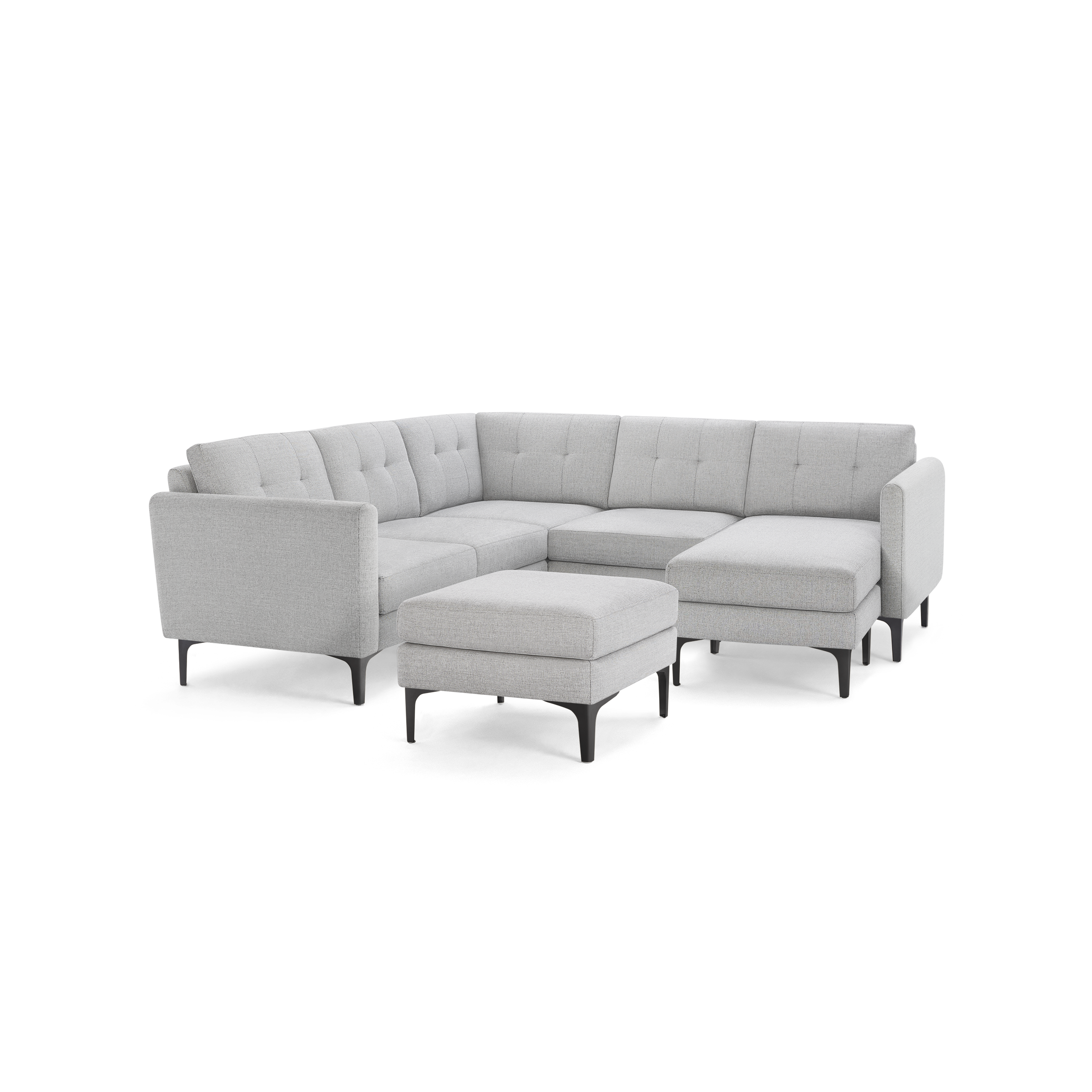 Light gray fabric sectional sofa with tufted backrest, metal legs, and matching ottoman. Modern and minimalist design.
