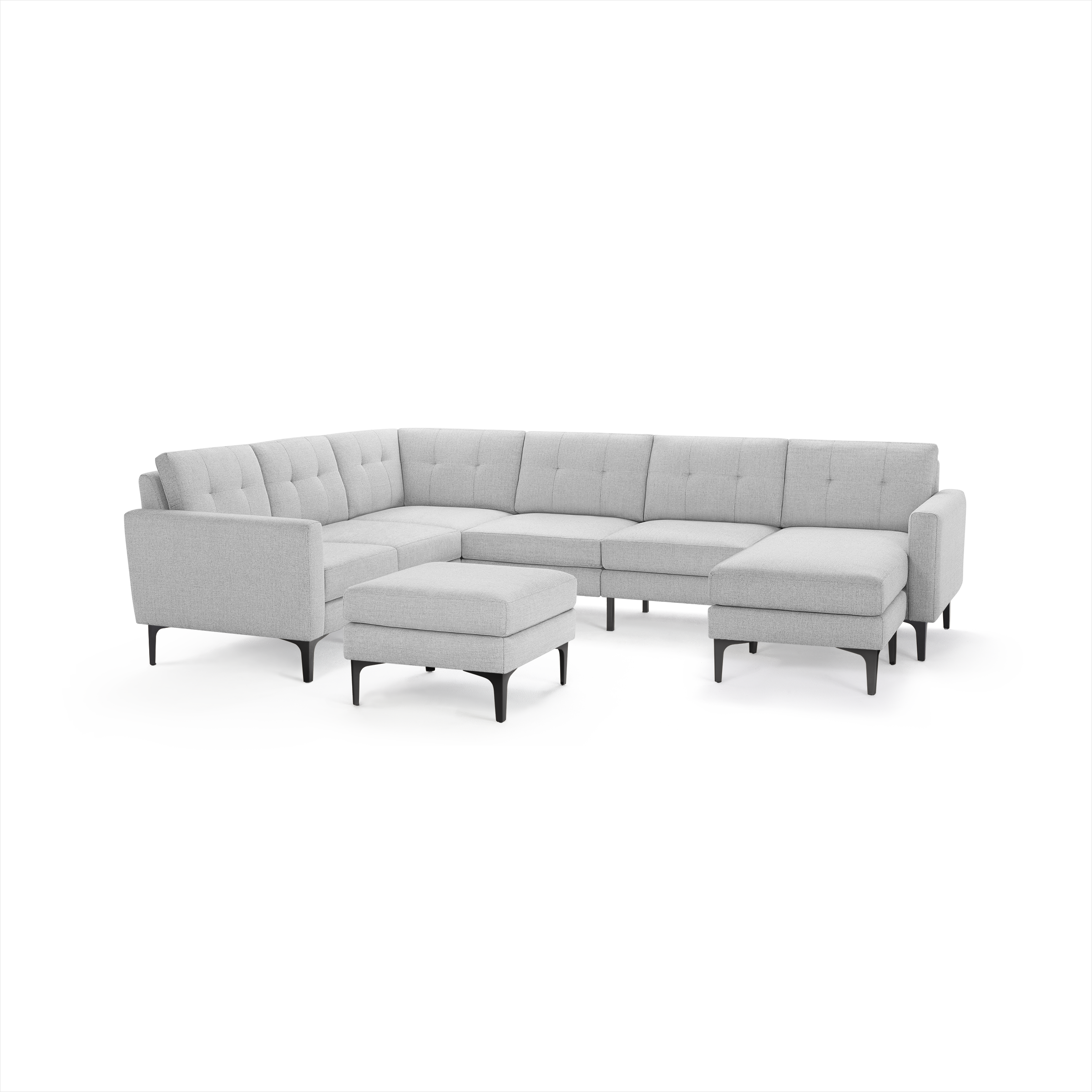 Light gray modern sectional sofa with tufted cushions, metal legs, and a matching square ottoman on a white background.