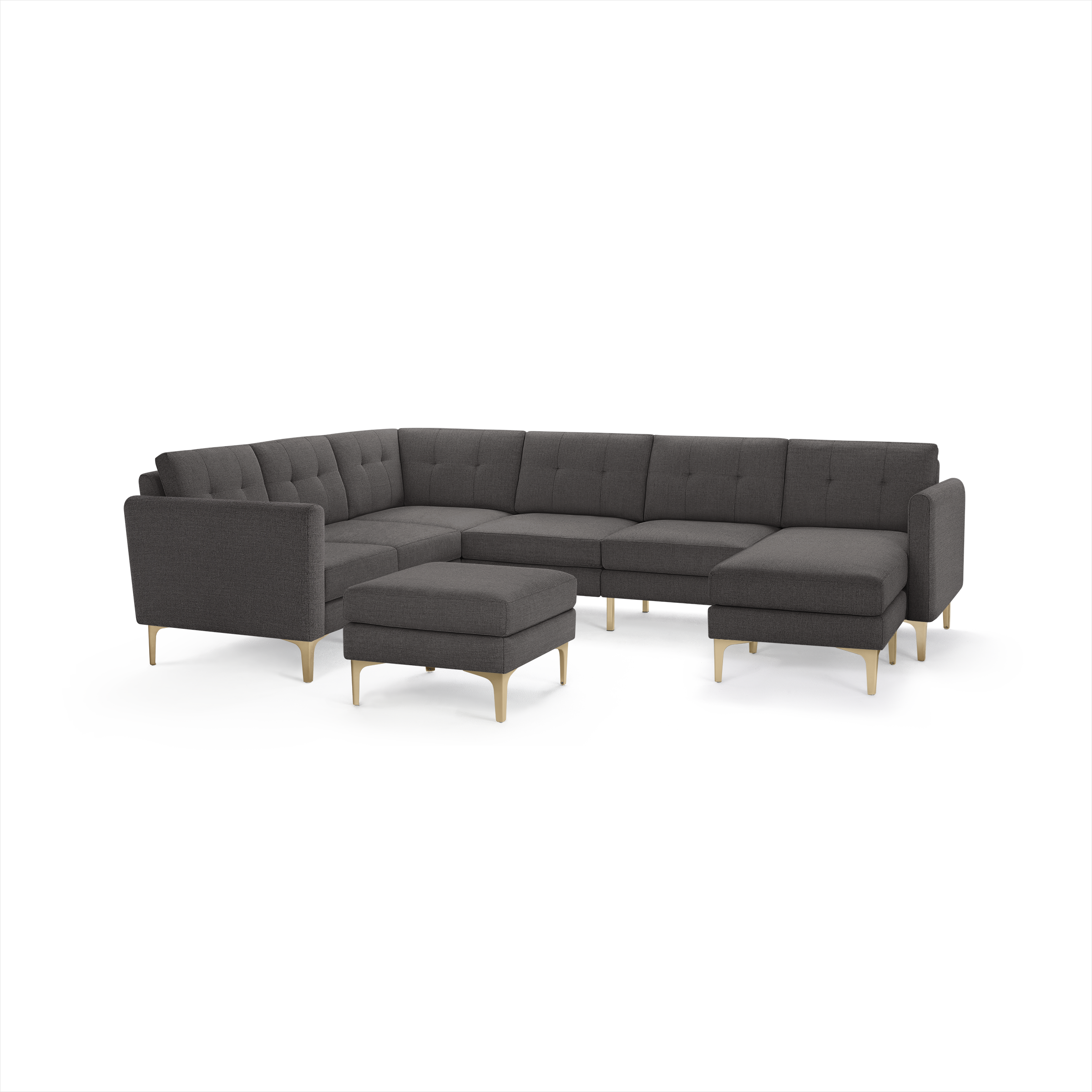 Modern dark gray L-shaped sectional sofa with button-tufted cushions, wooden legs, and matching ottoman.