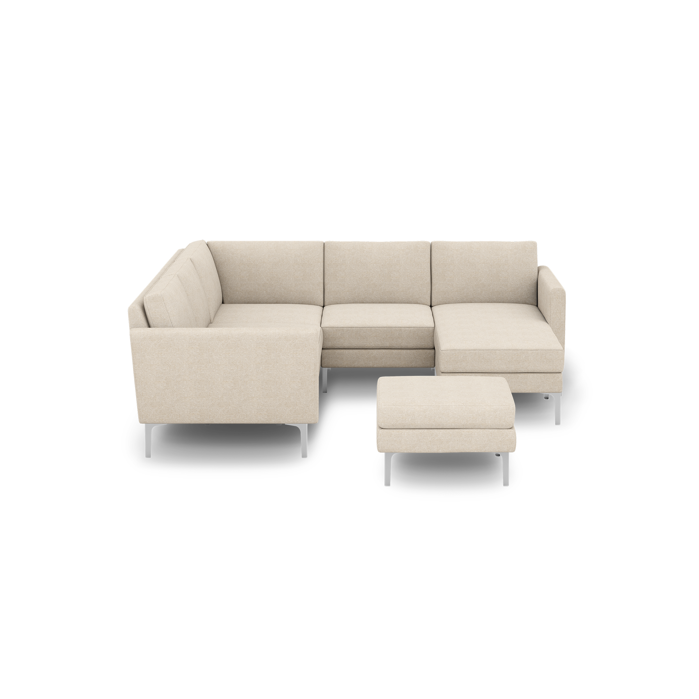 Beige fabric L-shaped sectional sofa with sleek metal legs and matching ottoman, modern and minimalist design isolated on black background.