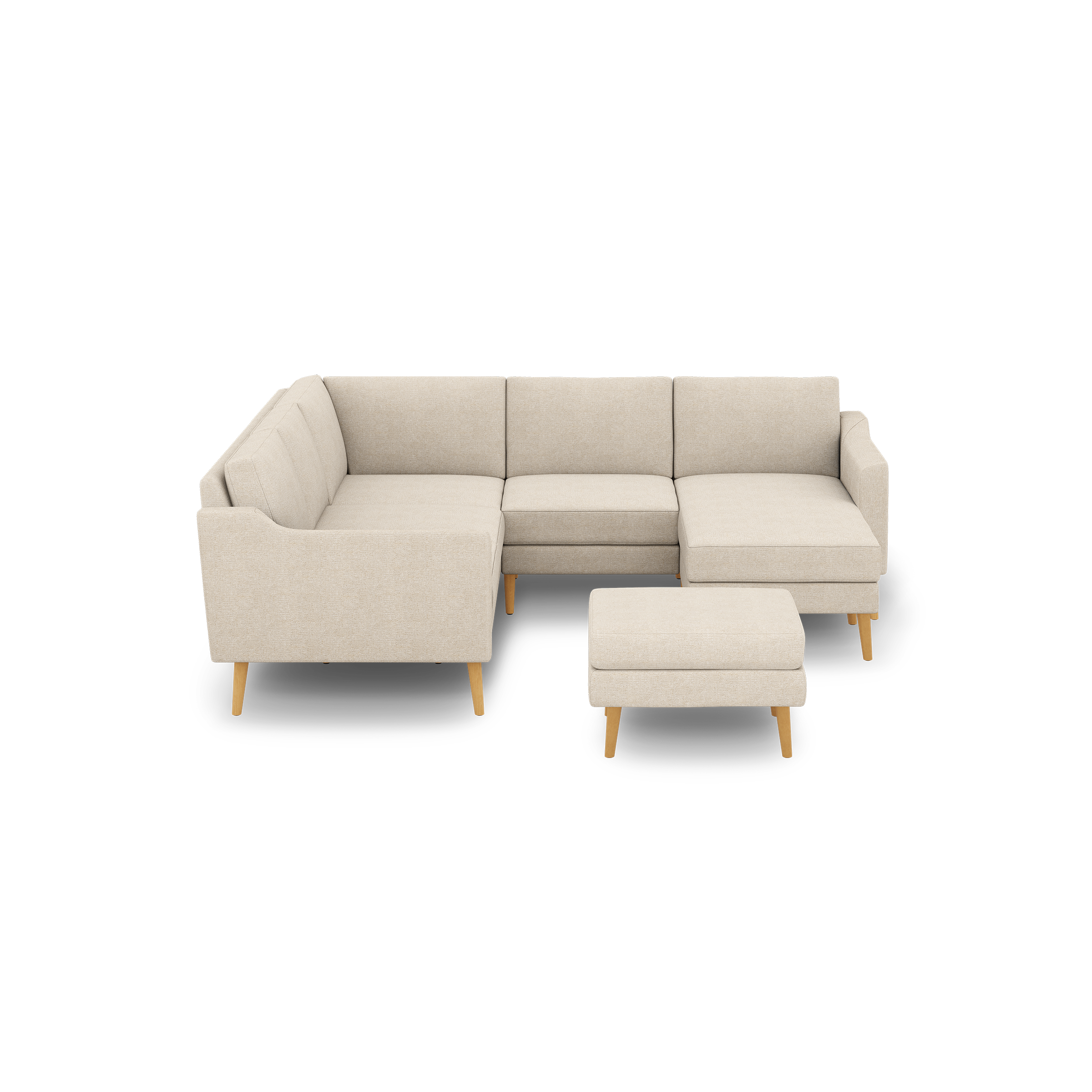 Beige L-shaped sectional sofa with wooden legs and matching ottoman, featuring clean lines and modern design.