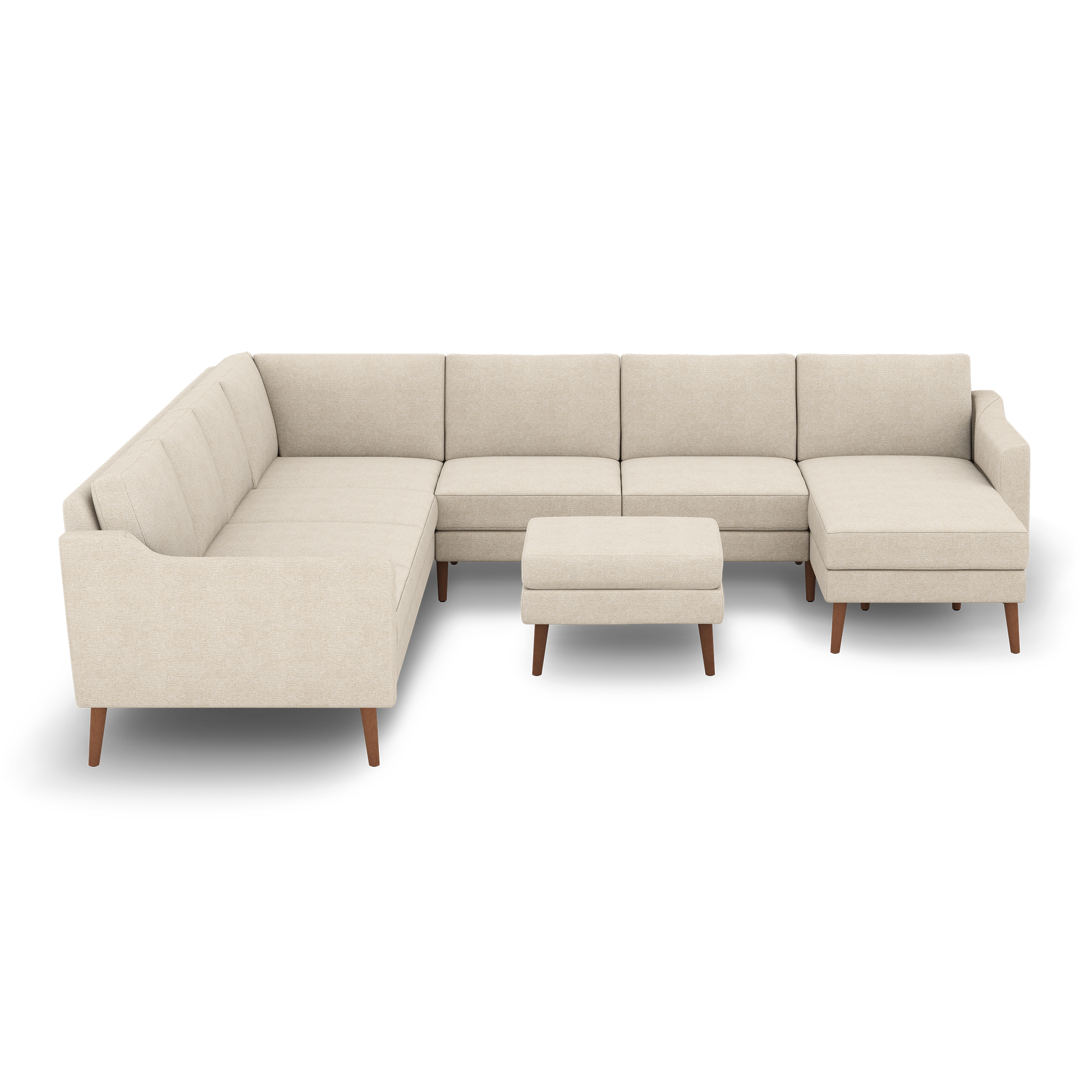 Beige L-shaped sectional sofa with mid-century wooden legs and matching ottoman, featuring clean lines and tufted cushions.