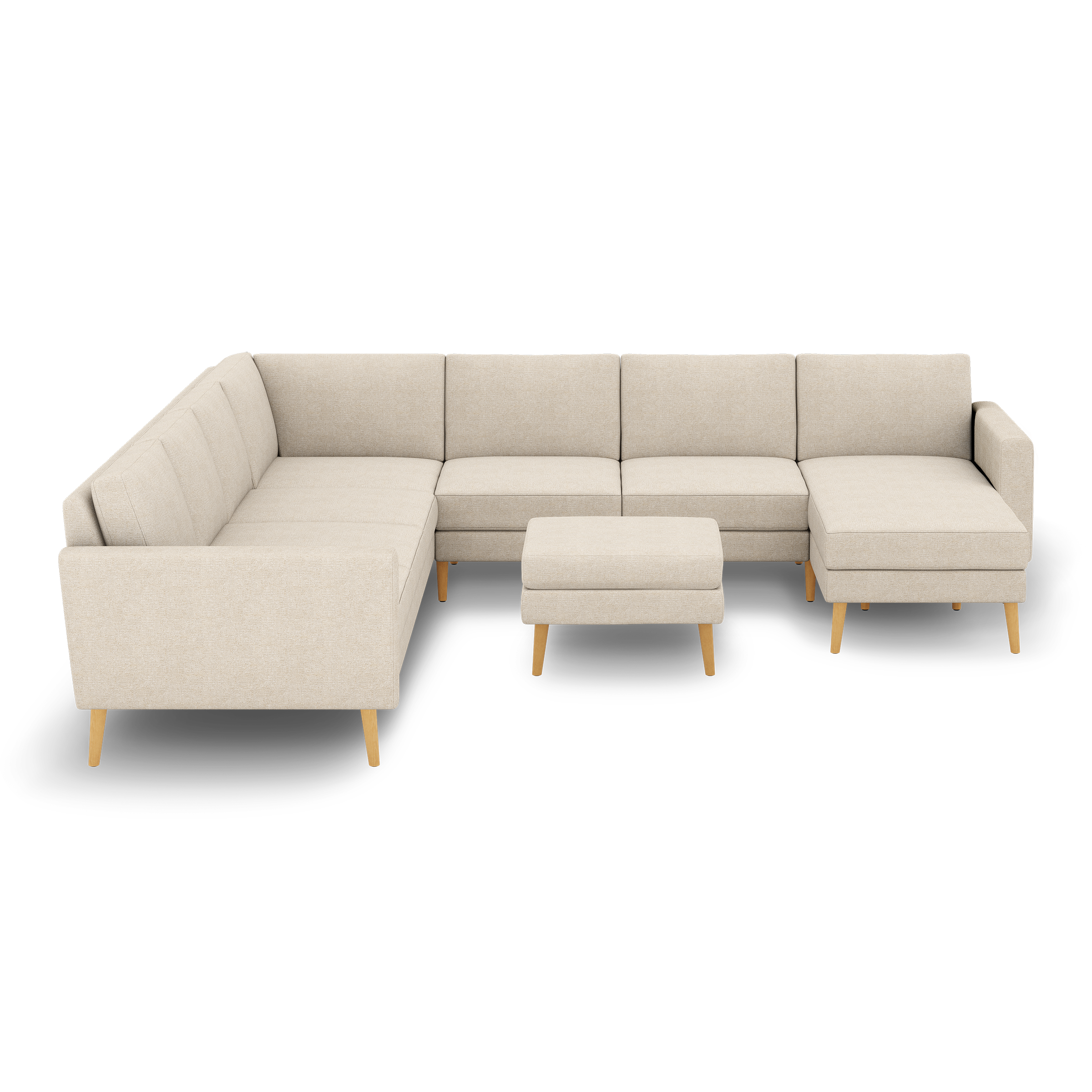 Beige sectional sofa with wooden legs and matching square ottoman, featuring clean lines and mid-century modern design.