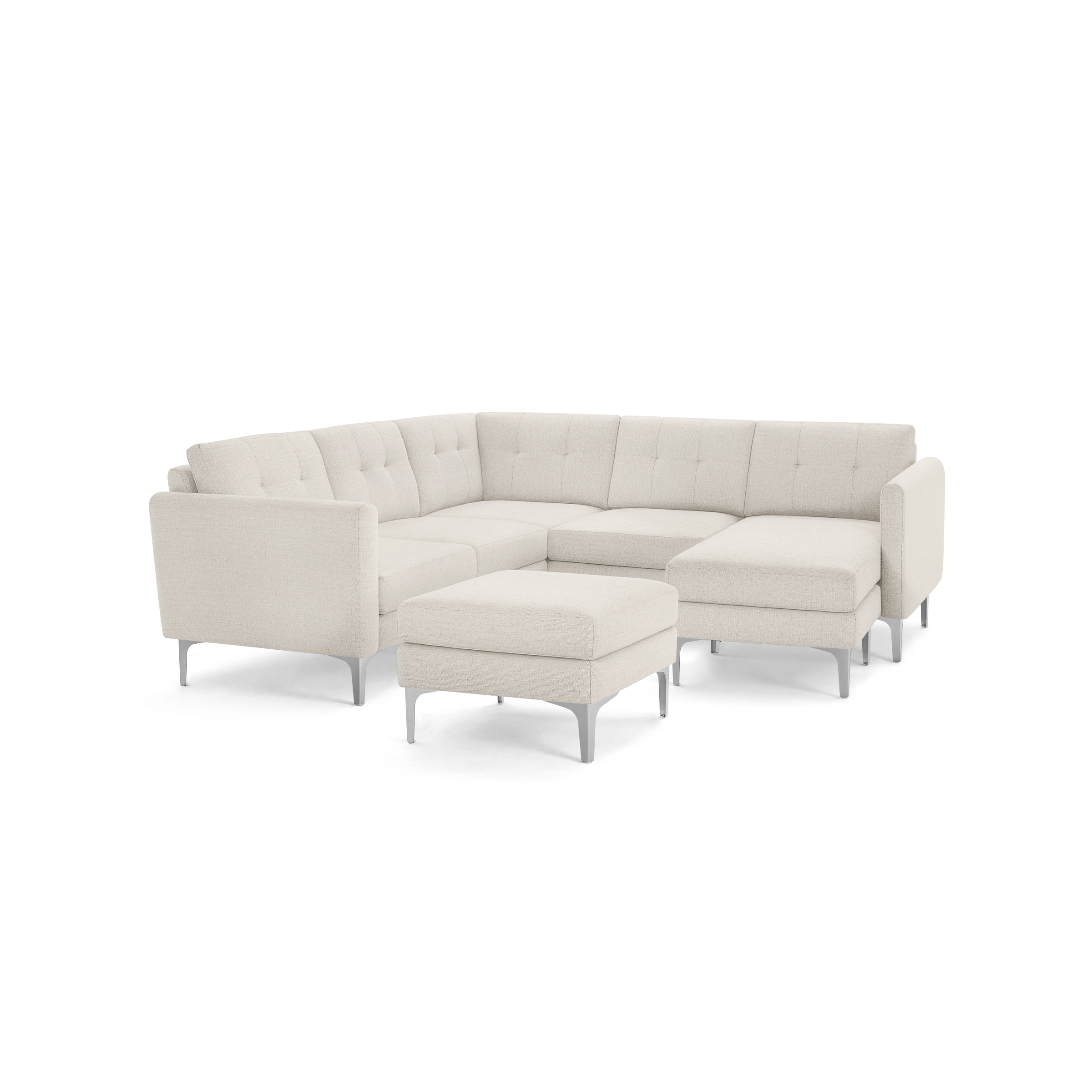 Modern beige fabric sectional sofa with tufted back cushions, metal legs, and matching ottoman, designed for corner seating.