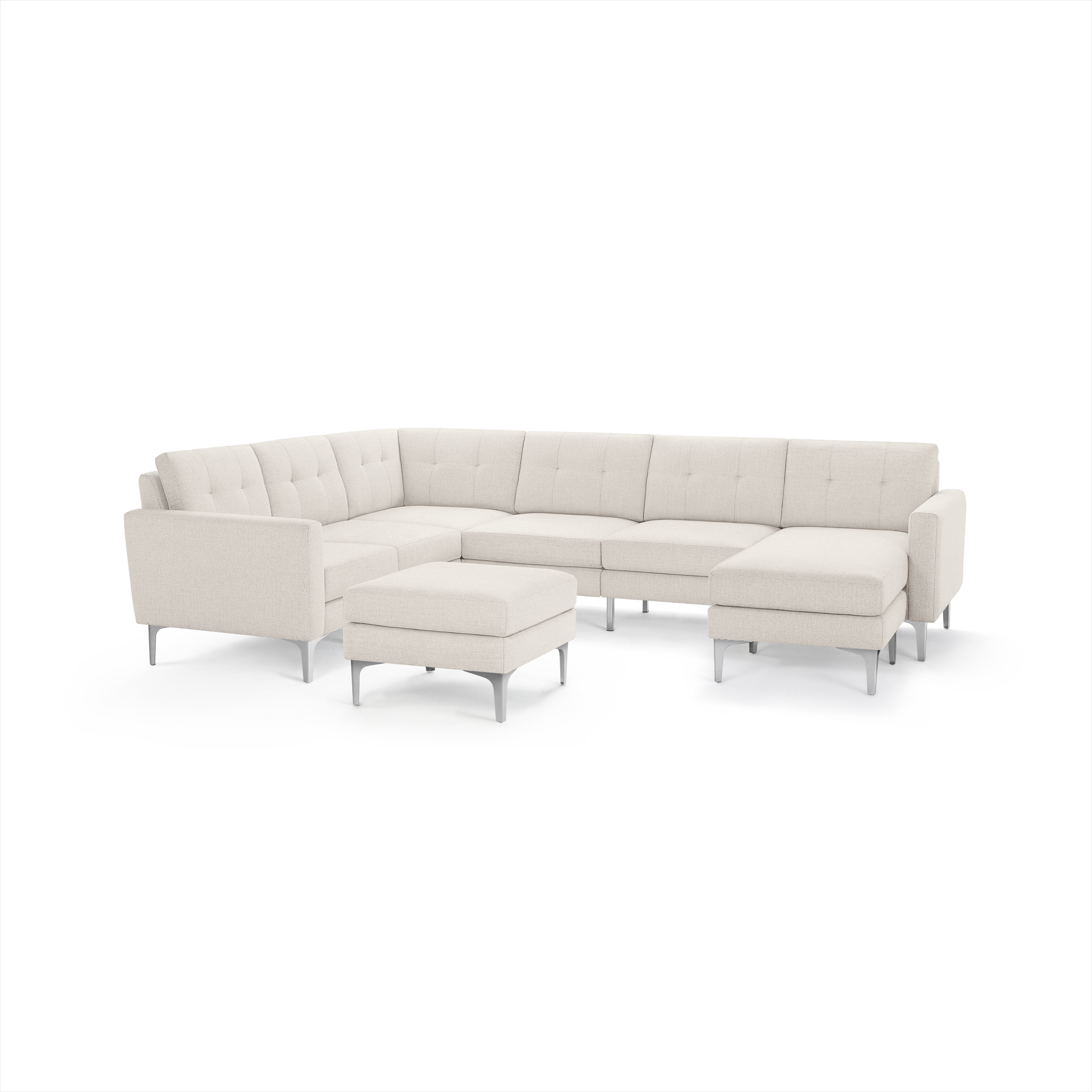 Modern light beige fabric sectional sofa with tufted cushions, metal legs, right-side chaise, and matching ottoman.