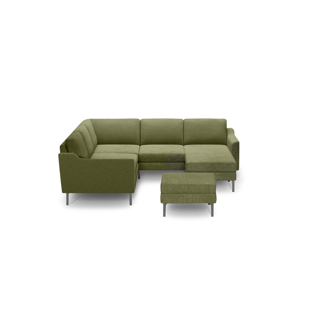 Modern olive green sectional sofa with sleek metal legs and matching cushioned ottoman on a black background.