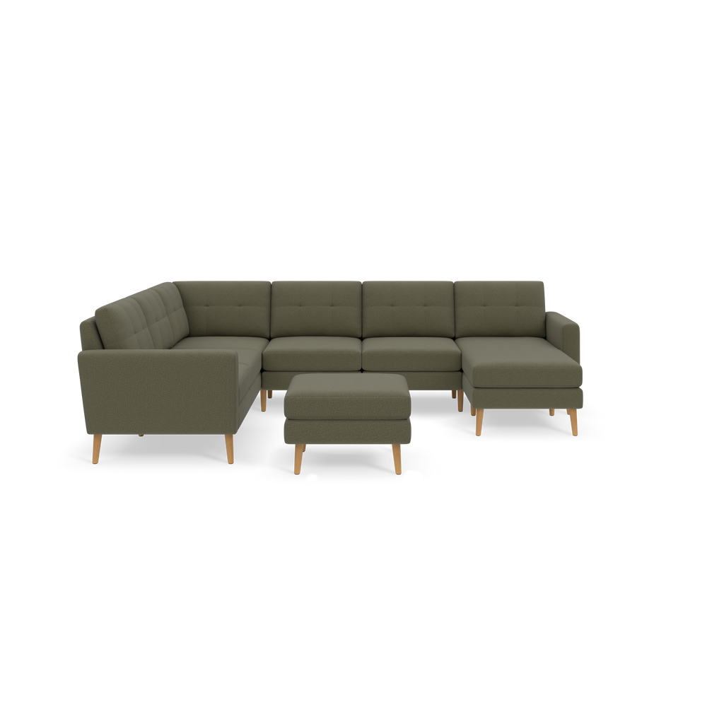Modern Moss green fabric sectional sofa with tufted backrests, wooden legs, and matching ottoman on black background.