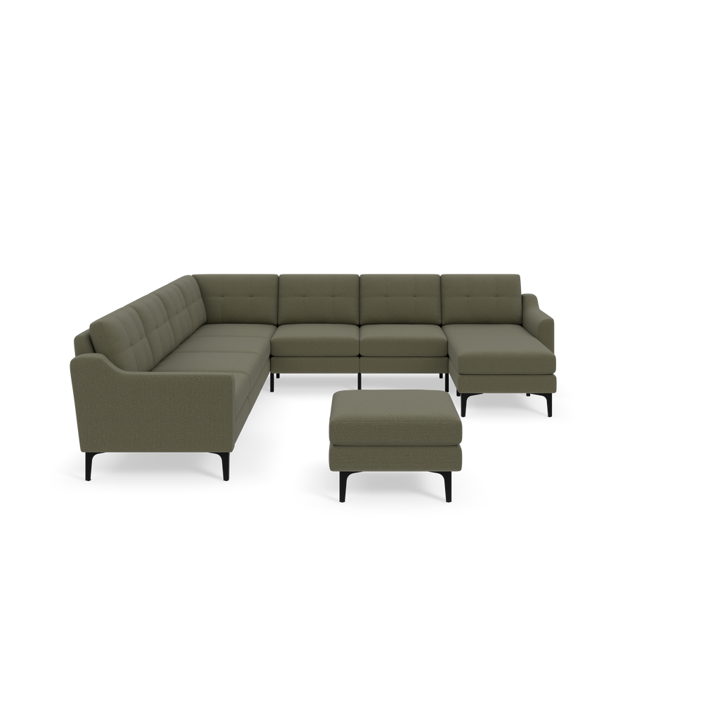 Modern L-shaped Moss green sectional sofa with tufted cushions and black legs, accompanied by matching ottoman.