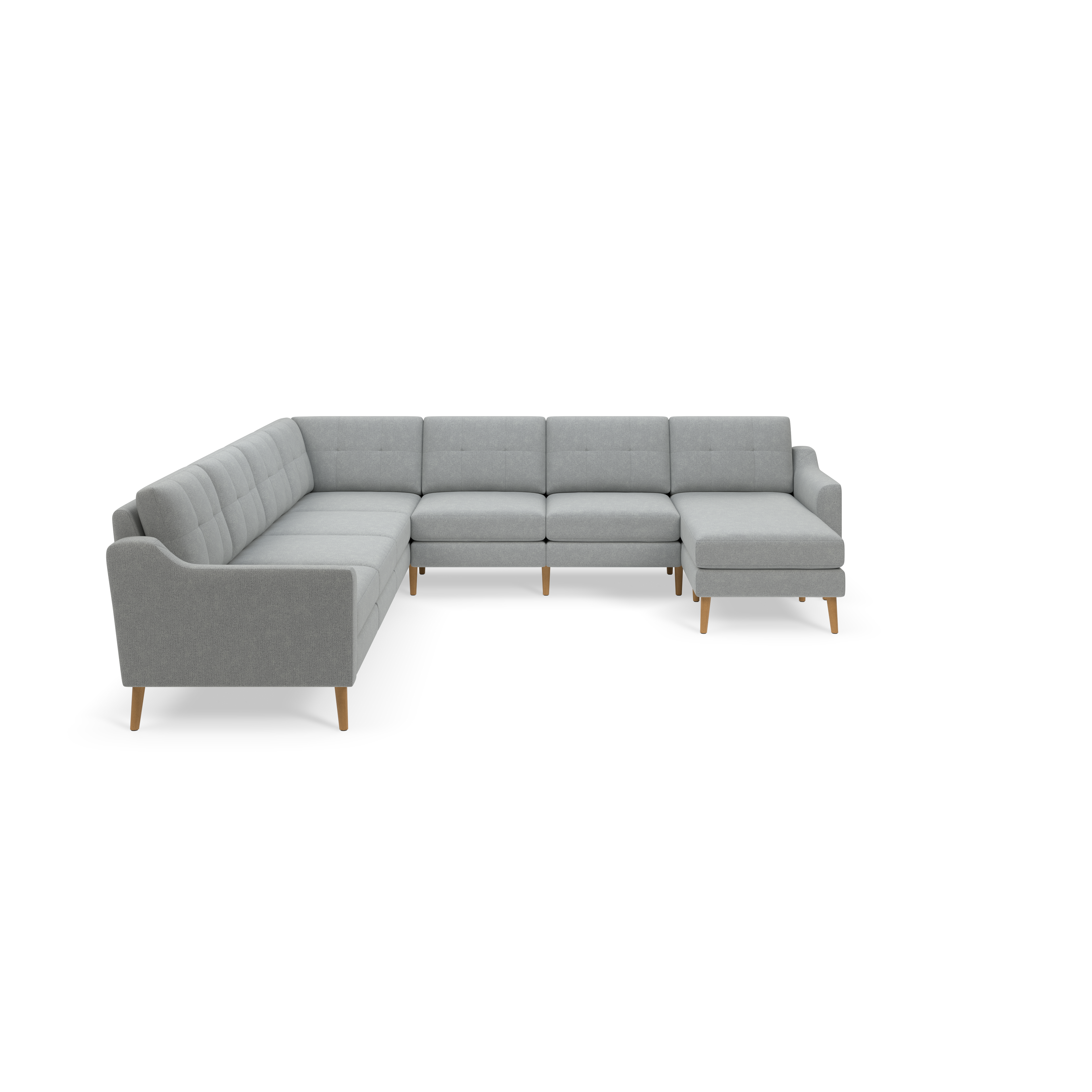 Light gray L-shaped sectional sofa with tufted cushions and wooden legs, modern and spacious design on black background.