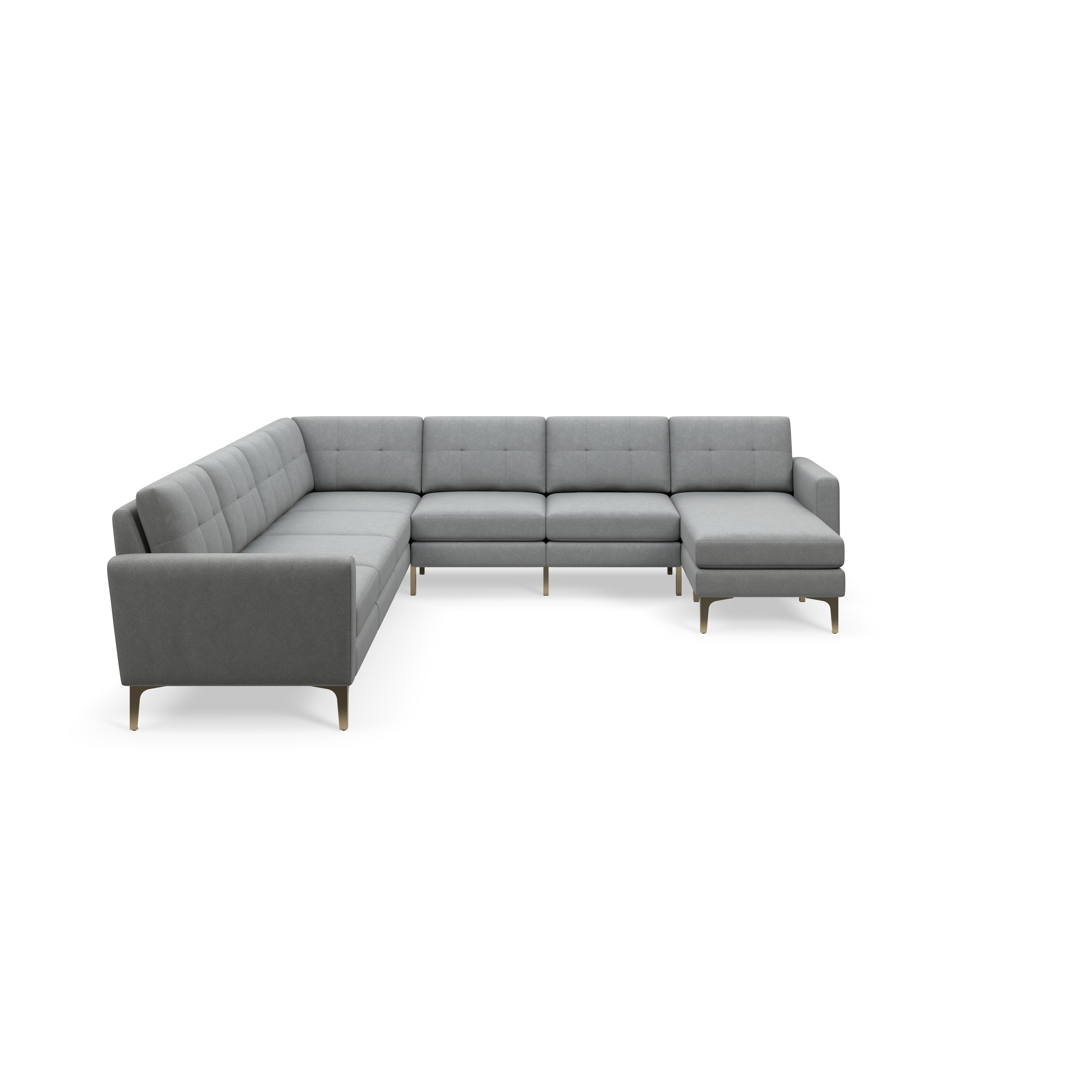 Modern gray L-shaped sectional sofa with tufted back cushions and slim gold legs, isolated on black background.
