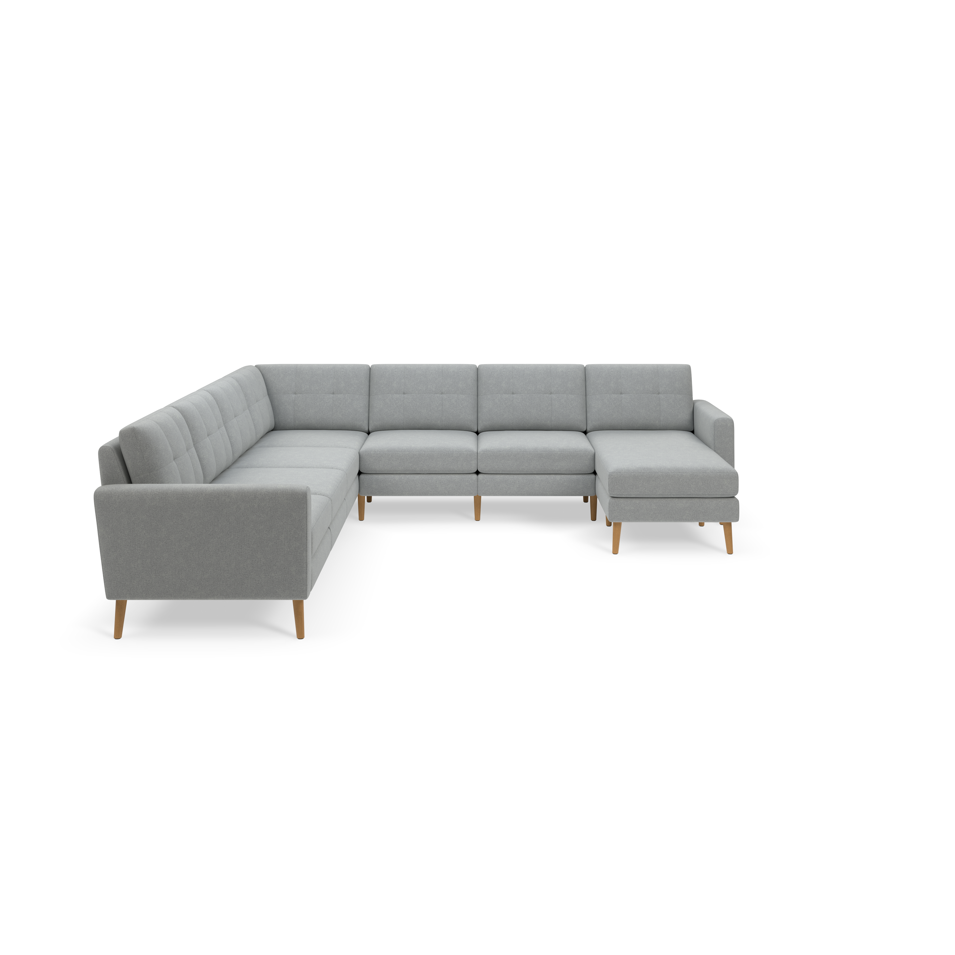 Modern light gray upholstered L-shaped sectional sofa with tufted back cushions and wooden tapered legs on black background.