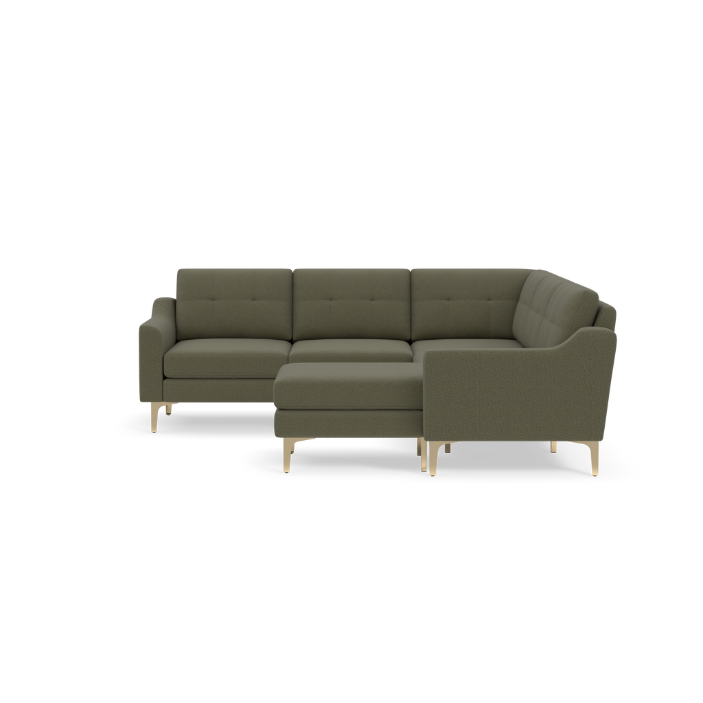 Modern L-shaped sectional sofa in olive green fabric with tufted back cushions and light wooden legs, shown on black background.