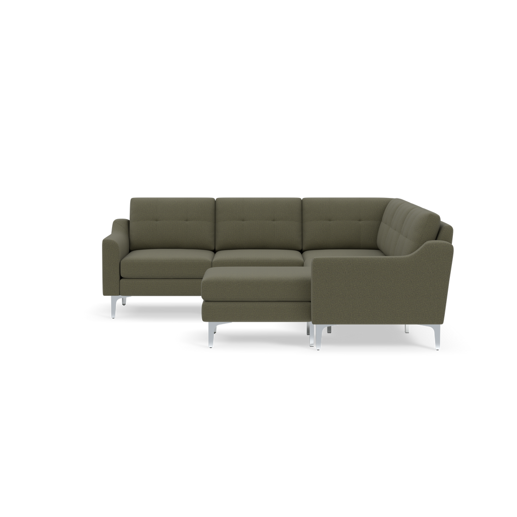 Modern L-shaped sectional sofa upholstered in olive green fabric with tufted back cushions and sleek silver legs, shown against a black background.