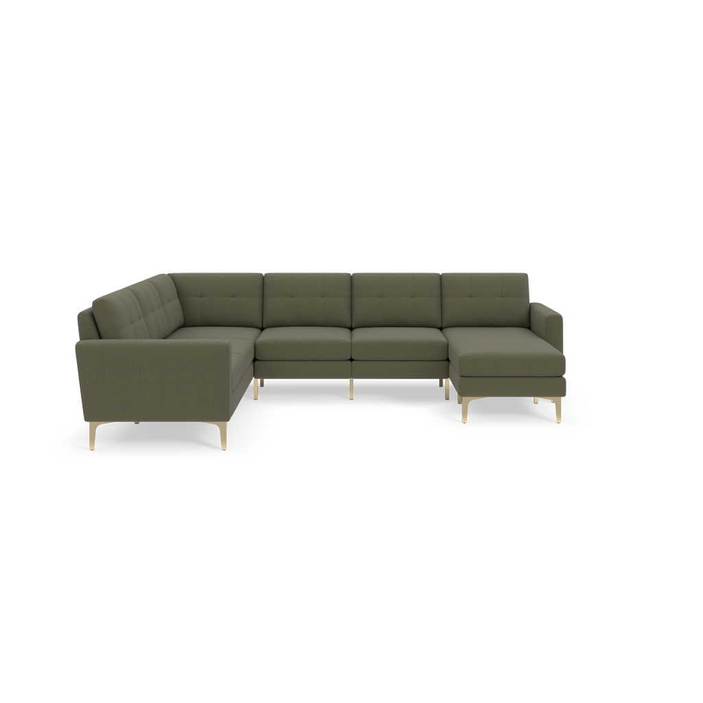 L-shaped sectional sofa with Moss green fabric upholstery, tufted back cushions, and light wood legs, set against a black background.