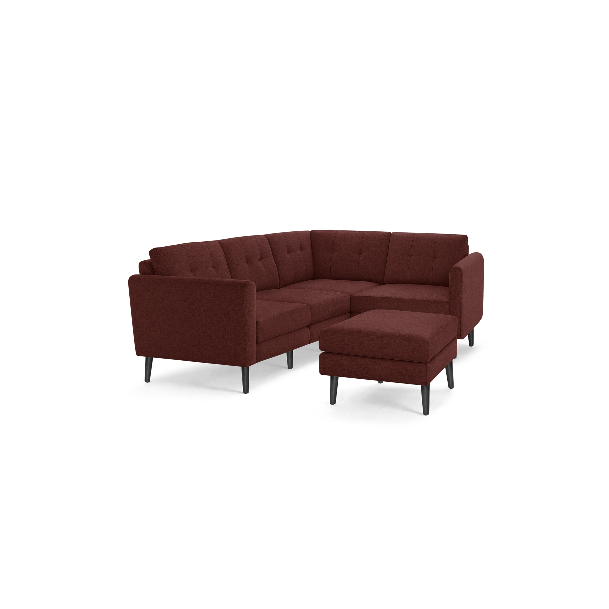 Modern L-shaped sectional sofa with deep red fabric upholstery, tufted back cushions, and black tapered wooden legs, including a matching ottoman.