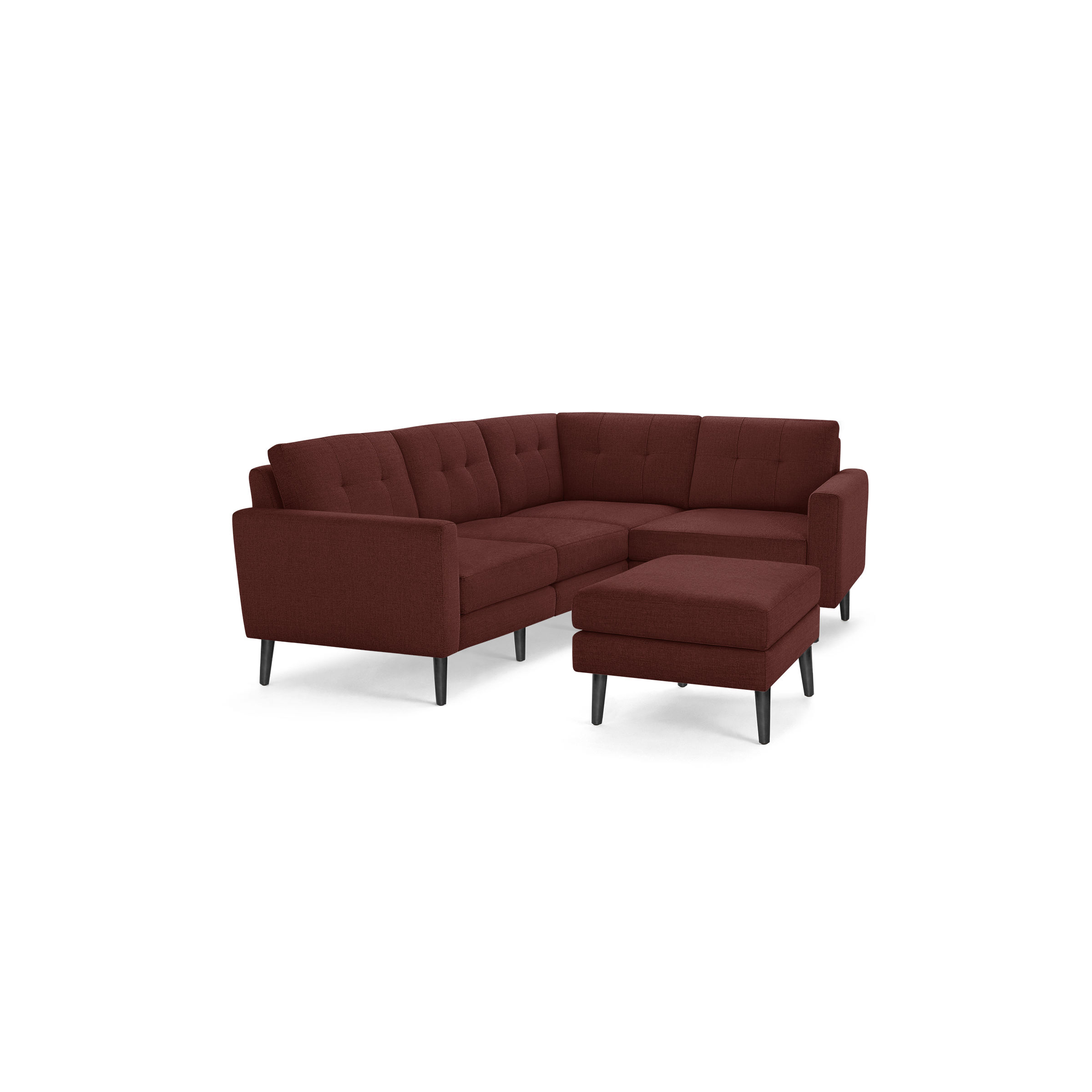Modern L-shaped sectional sofa with matching ottoman, upholstered in deep red fabric, featuring tufted cushions and dark wooden legs.