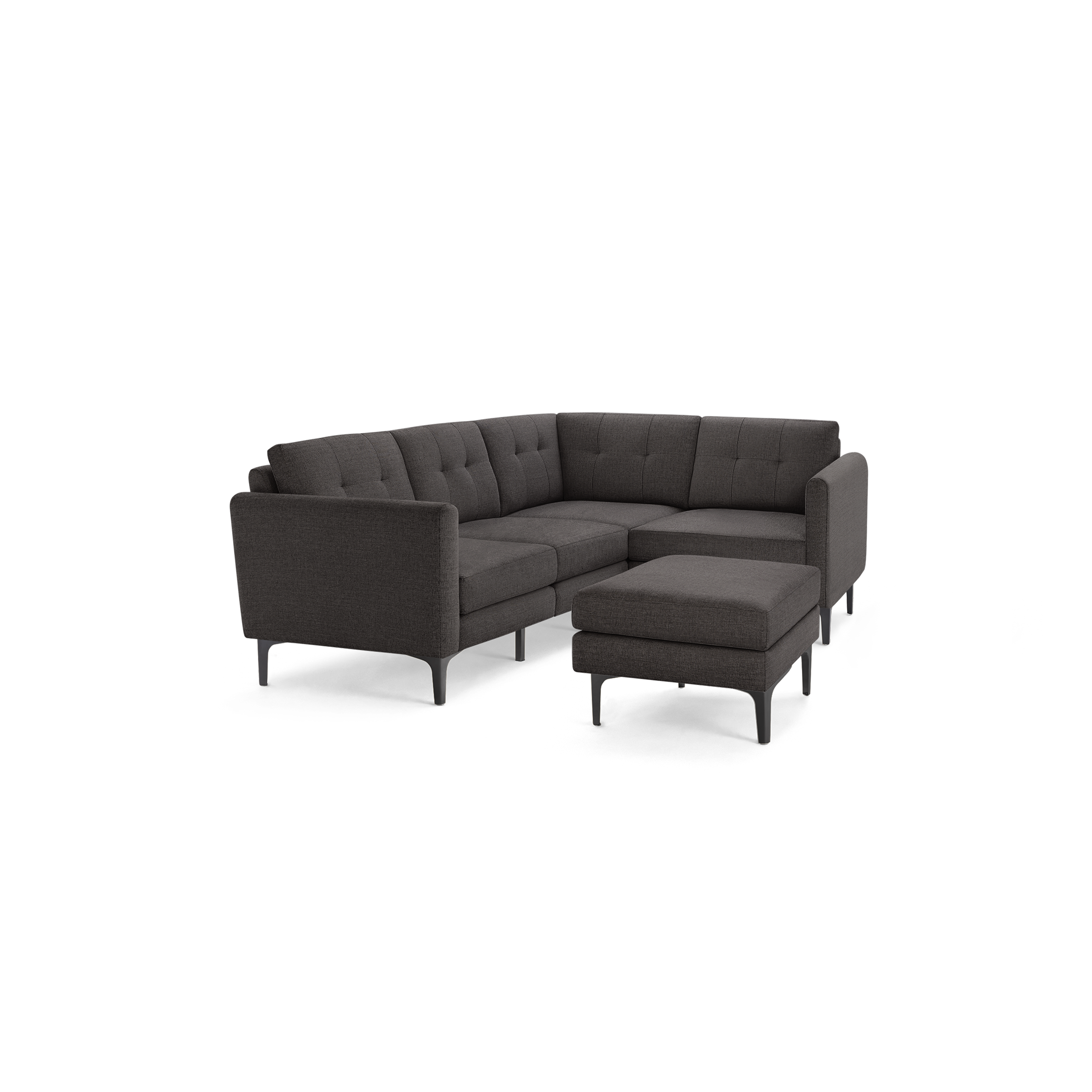 Dark gray upholstered L-shaped sectional sofa with tufted back cushions and matching ottoman on black metal legs.