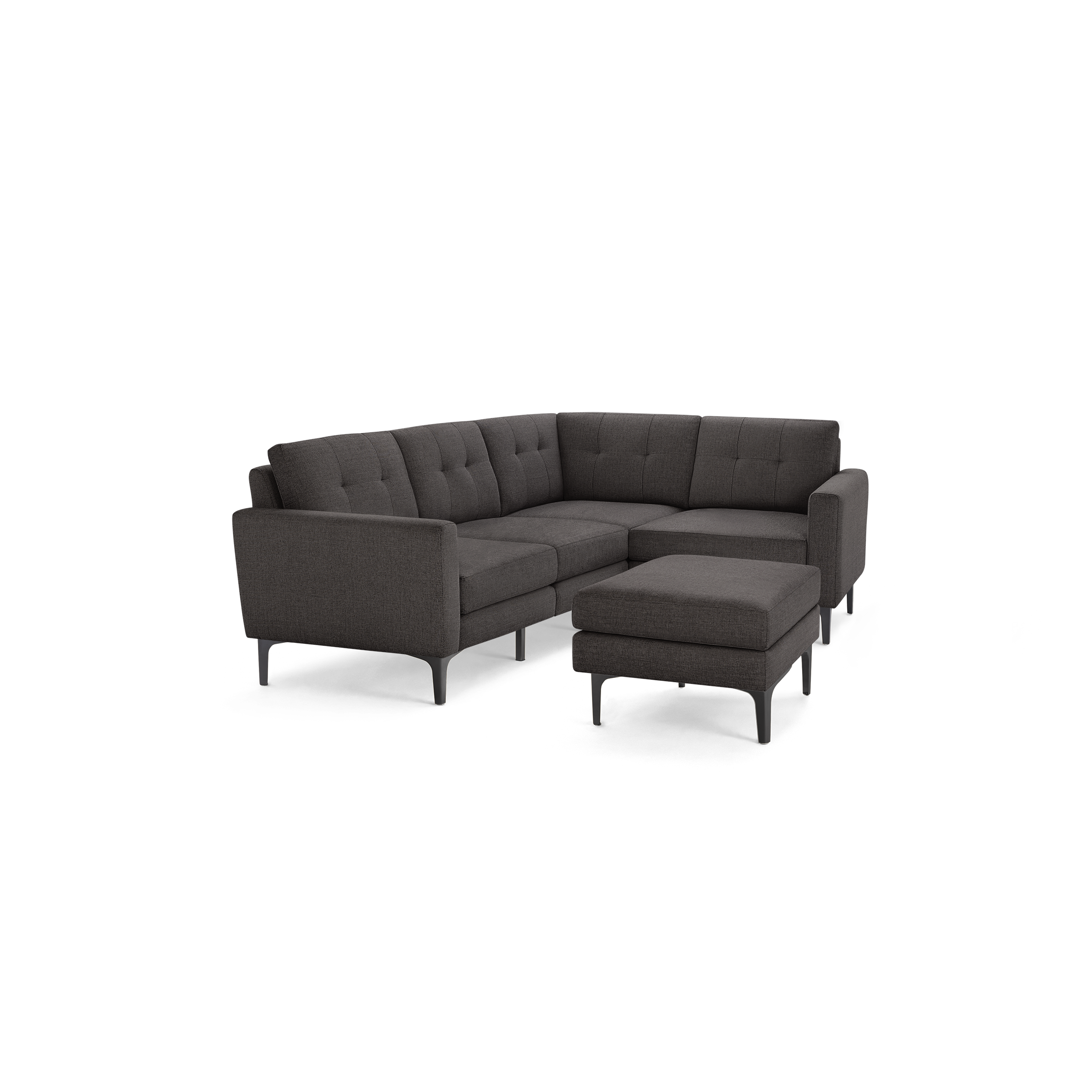 L-shaped dark gray sectional sofa with tufted back cushions and a matching ottoman on slender black metal legs.