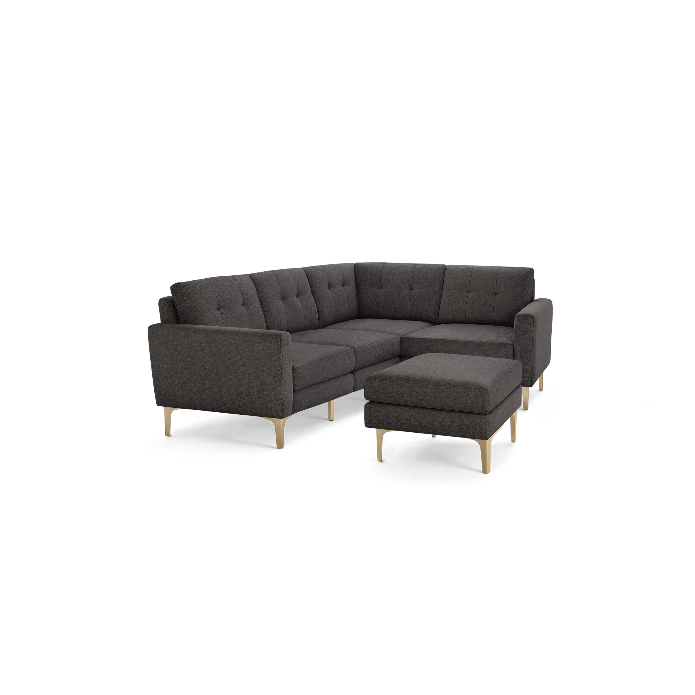 Dark gray L-shaped tufted fabric sectional sofa with wooden legs and matching ottoman.