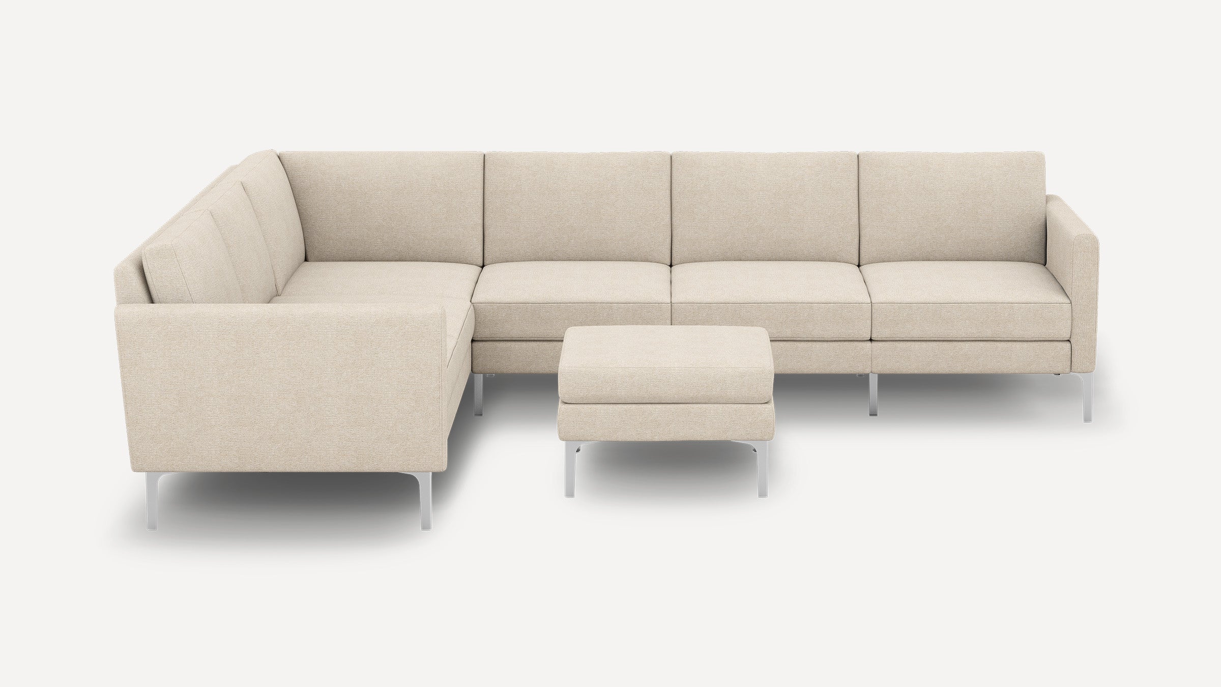 Beige L-shaped sectional sofa with clean lines, metal legs, tufted cushions, and a matching square ottoman on a white background.