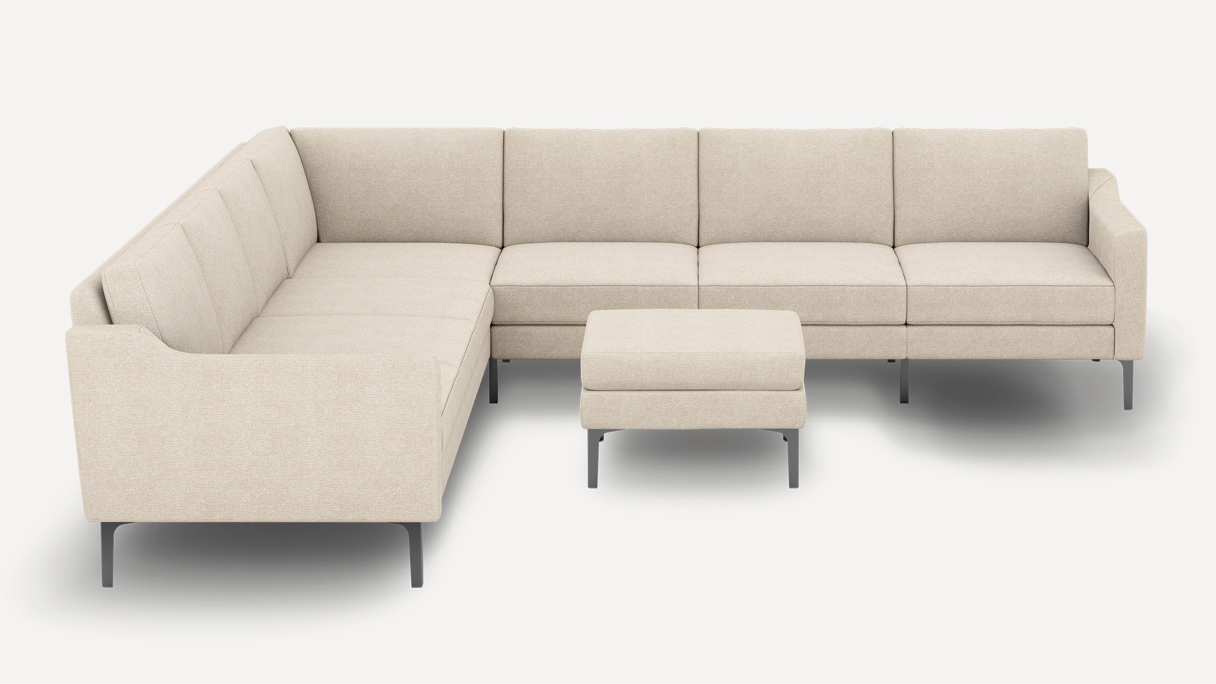 Beige modern L-shaped sectional sofa with metal legs and matching square ottoman, set against white background.