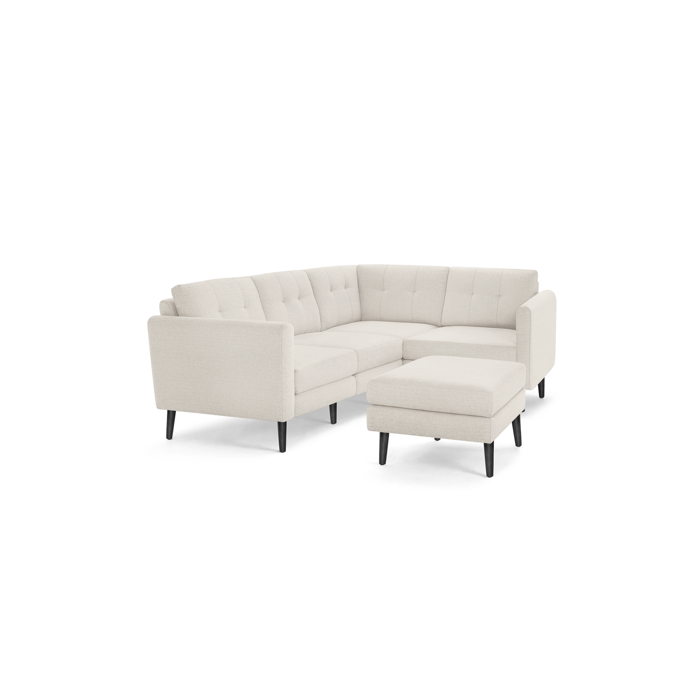 Beige modern sectional sofa with tufted back cushions, wooden legs, and matching upholstered ottoman on a black background.