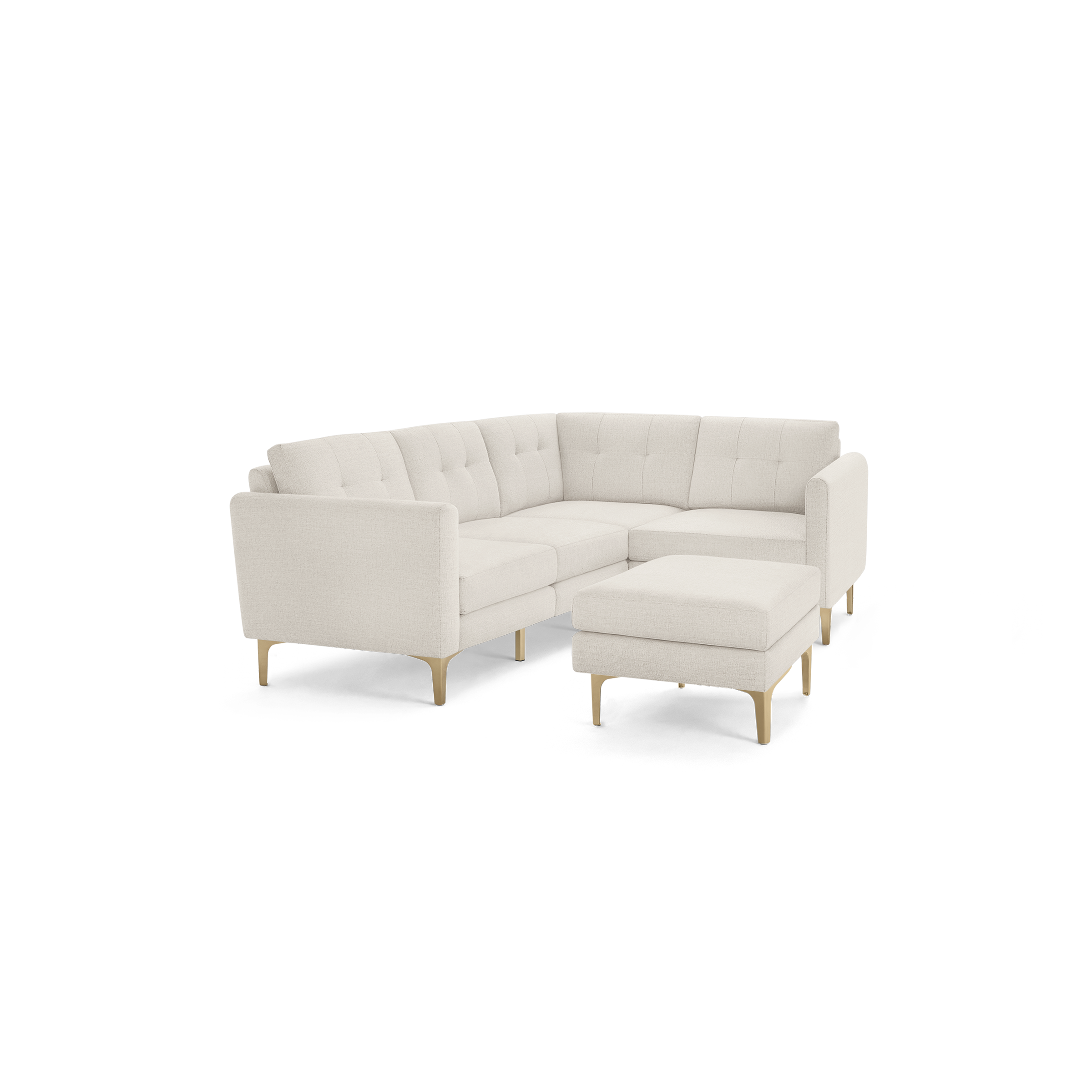 Light beige L-shaped sectional sofa with tufted cushions and wooden legs, accompanied by a matching ottoman.
