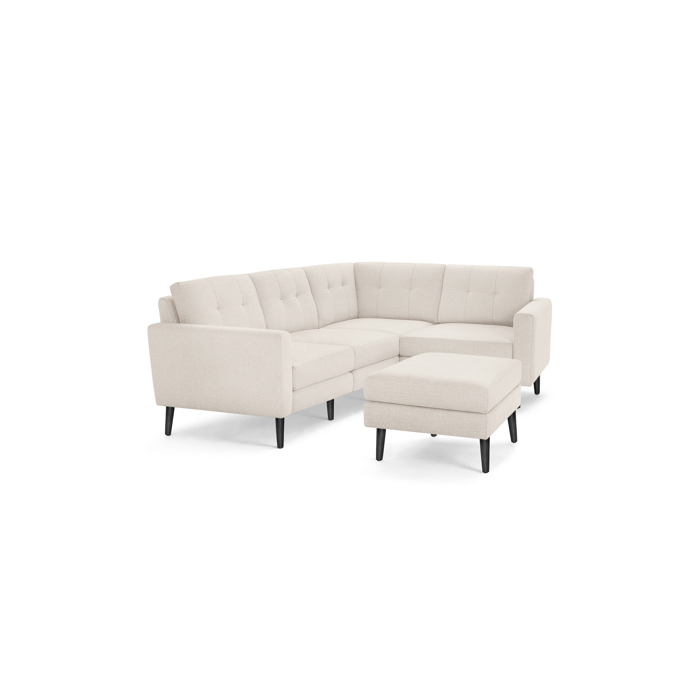 Beige L-shaped sectional sofa with tufted cushions and matching ottoman, supported by black wooden legs.
