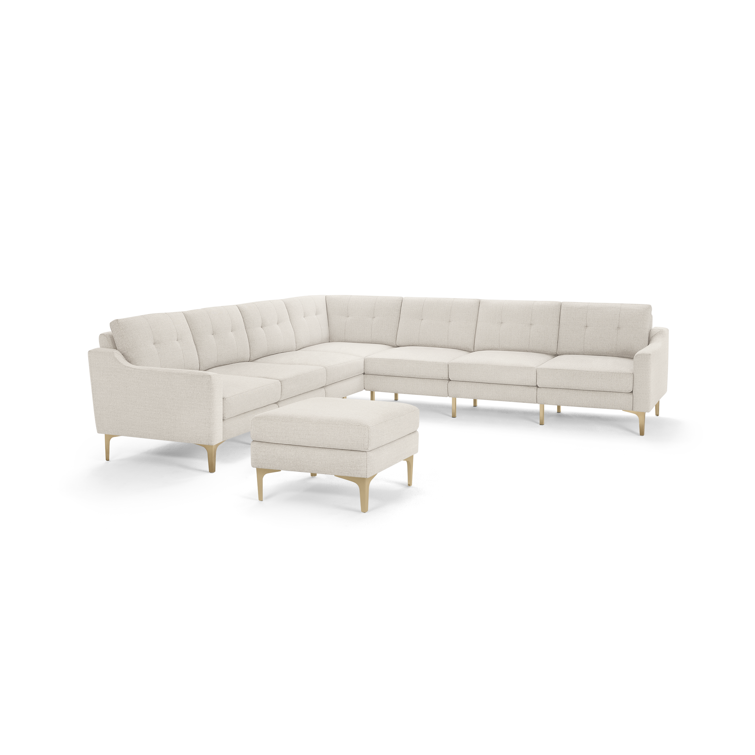 Beige L-shaped sectional sofa with tufted cushions, sleek wooden legs, and matching ottoman, modern and minimalist design.