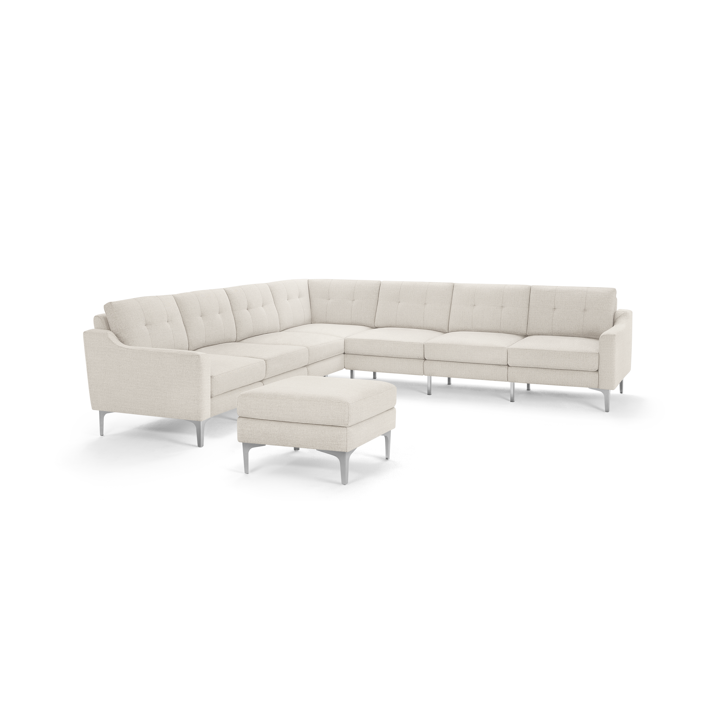 Light beige L-shaped sectional sofa with tufted cushions, metal legs, and matching ottoman, designed for modern living rooms.