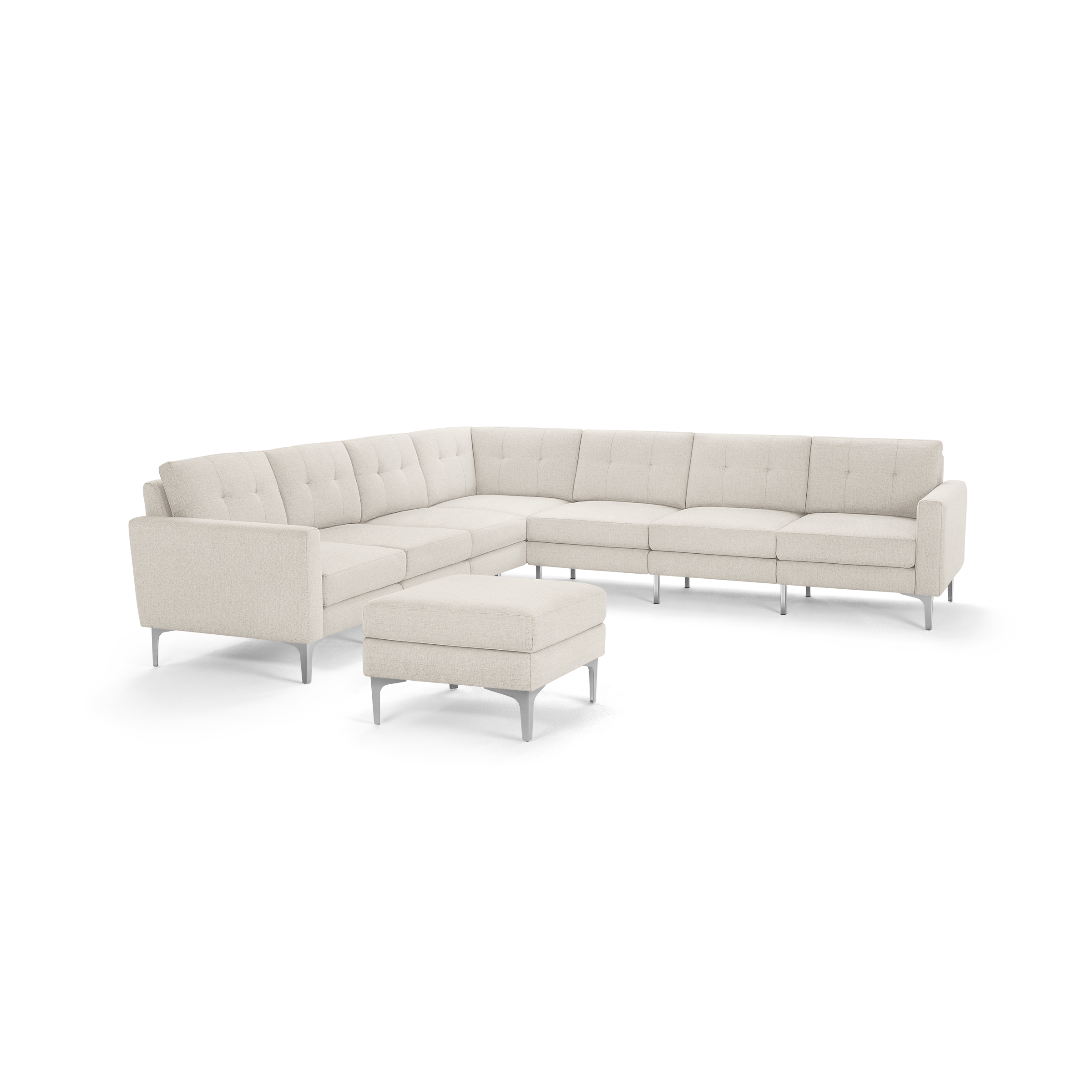 Cream-colored modern L-shaped sectional sofa with tufted cushions and matching ottoman, featuring sleek metal legs.