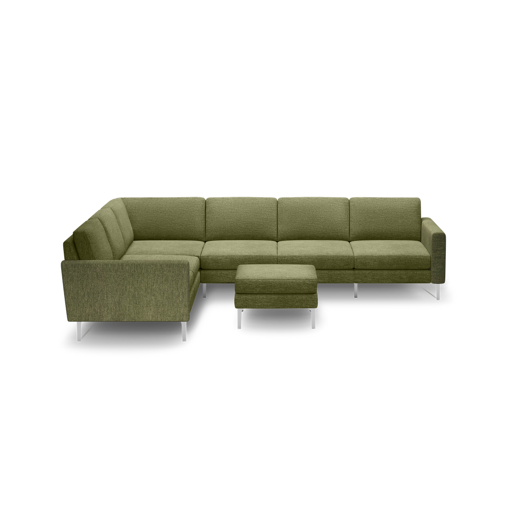 Olive green L-shaped sectional sofa with matching ottoman and silver metal legs, modern design, upholstered fabric.
