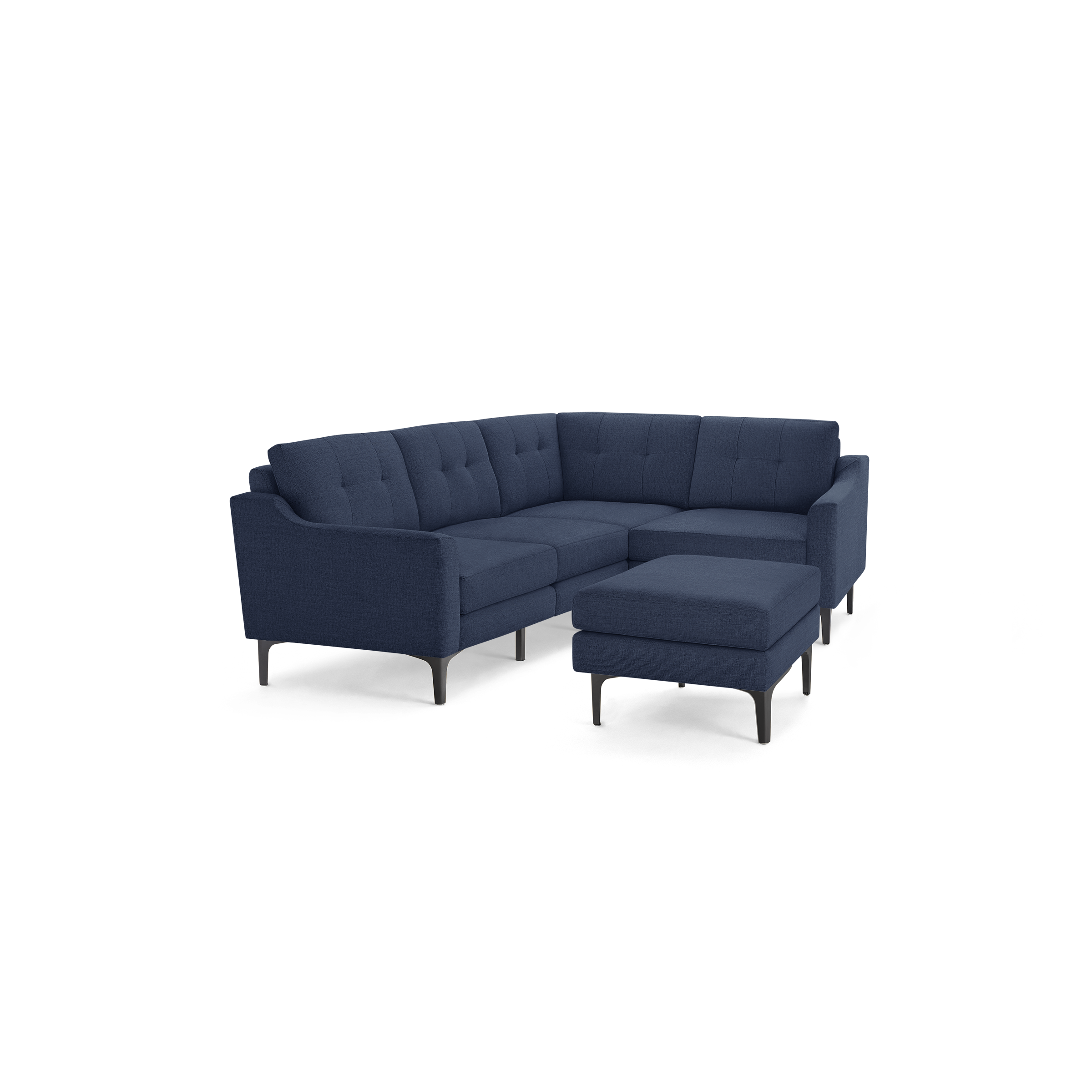 Modern navy blue sectional sofa with tufted cushions, angled arms, and black slim legs, accompanied by a matching ottoman.