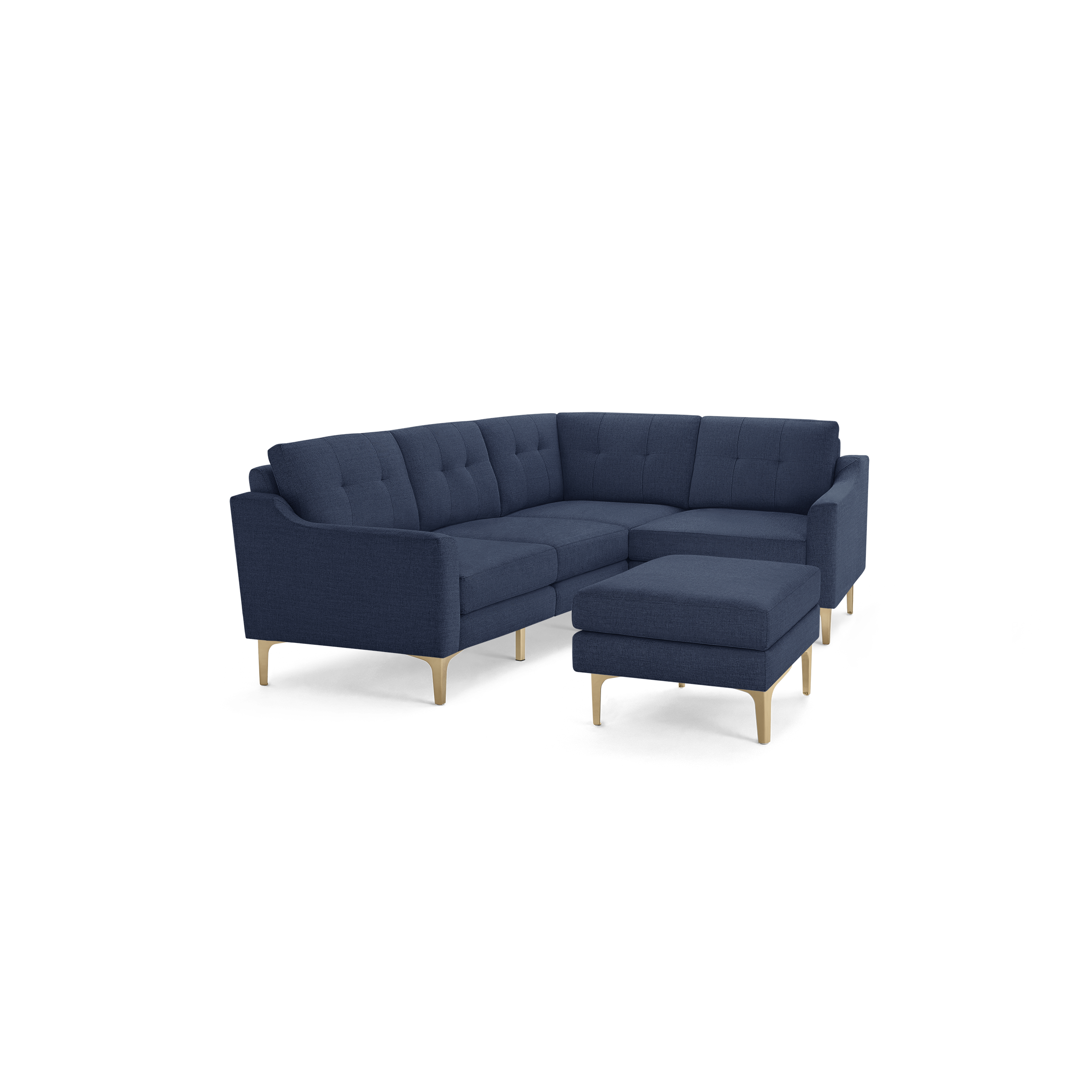 Modern navy blue fabric sectional sofa with tufted back cushions and light wood legs, accompanied by a matching ottoman.