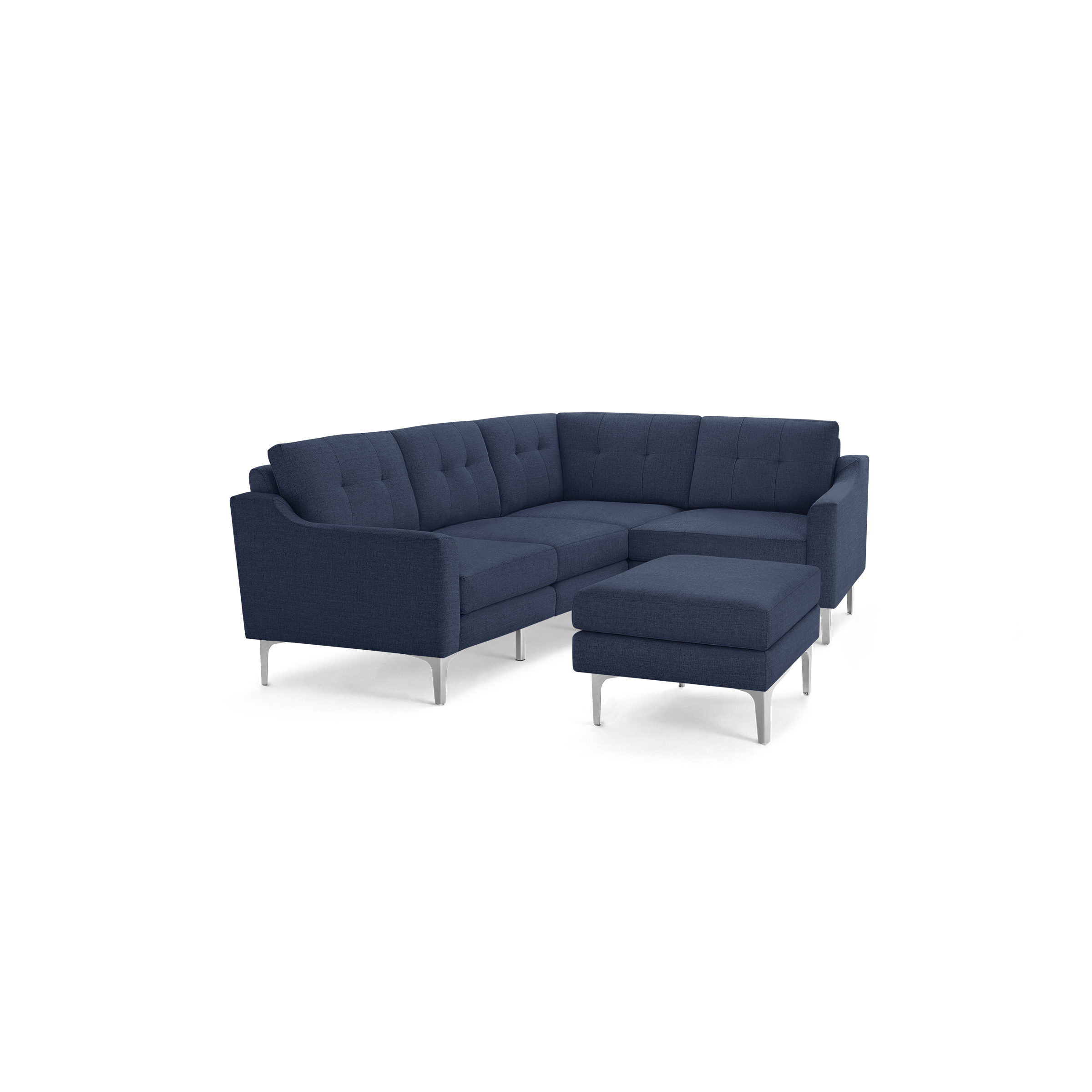 Modern navy blue fabric sectional sofa with tufted back cushions and matching rectangular ottoman on silver metal legs.