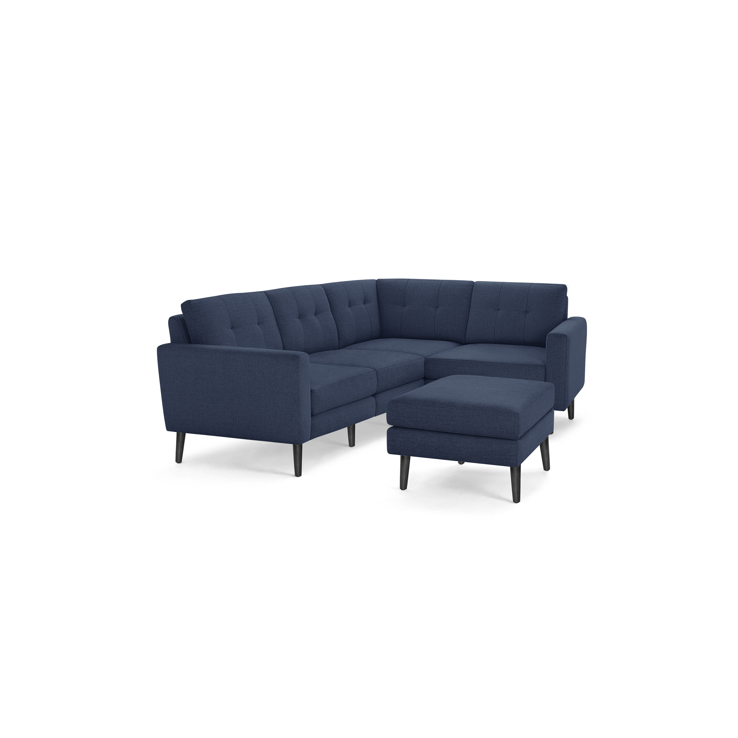 Modern navy blue fabric sectional sofa with tufted cushions and matching ottoman, supported by black wooden legs.