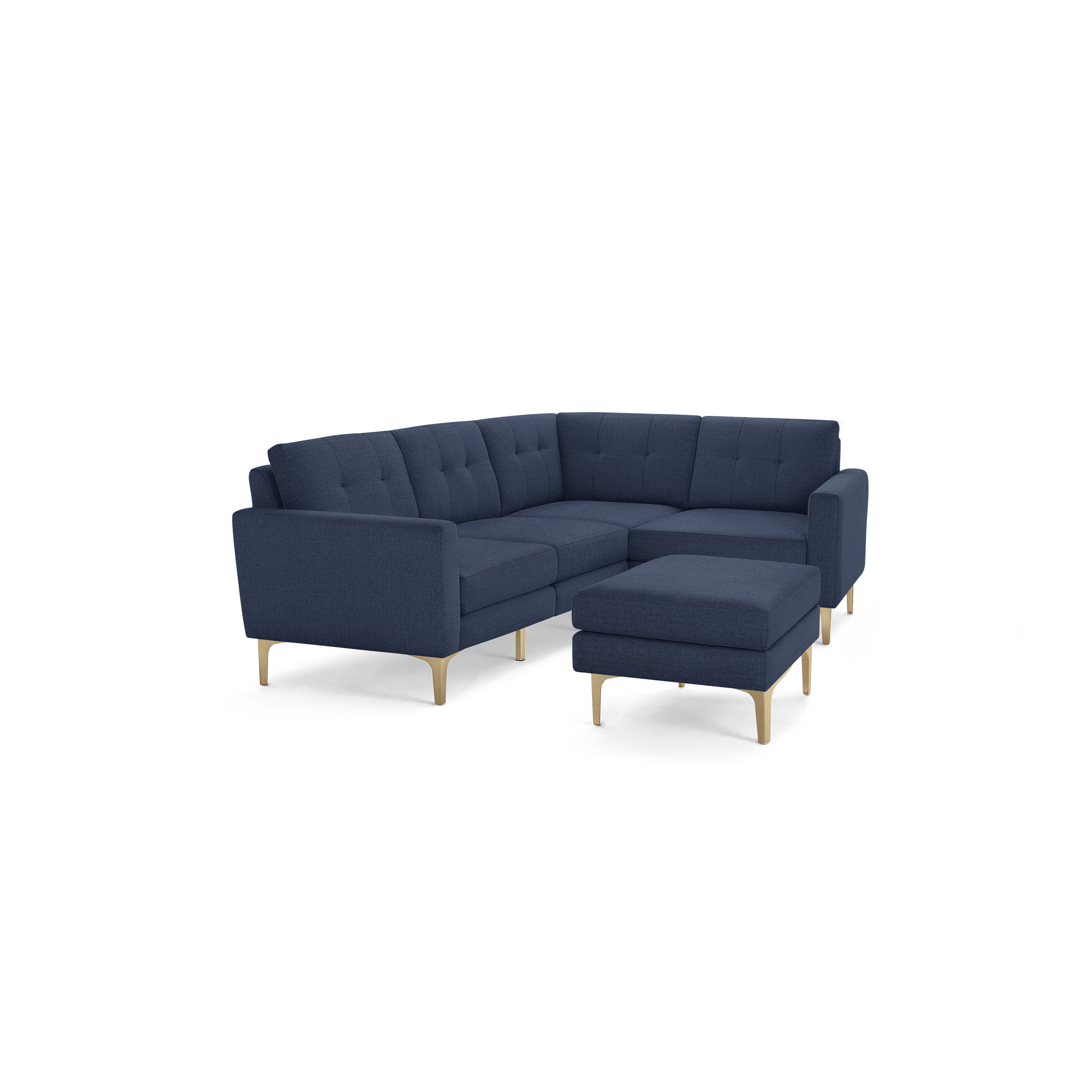 Dark blue fabric sectional sofa with tufted cushions and wooden legs, featuring a matching ottoman.