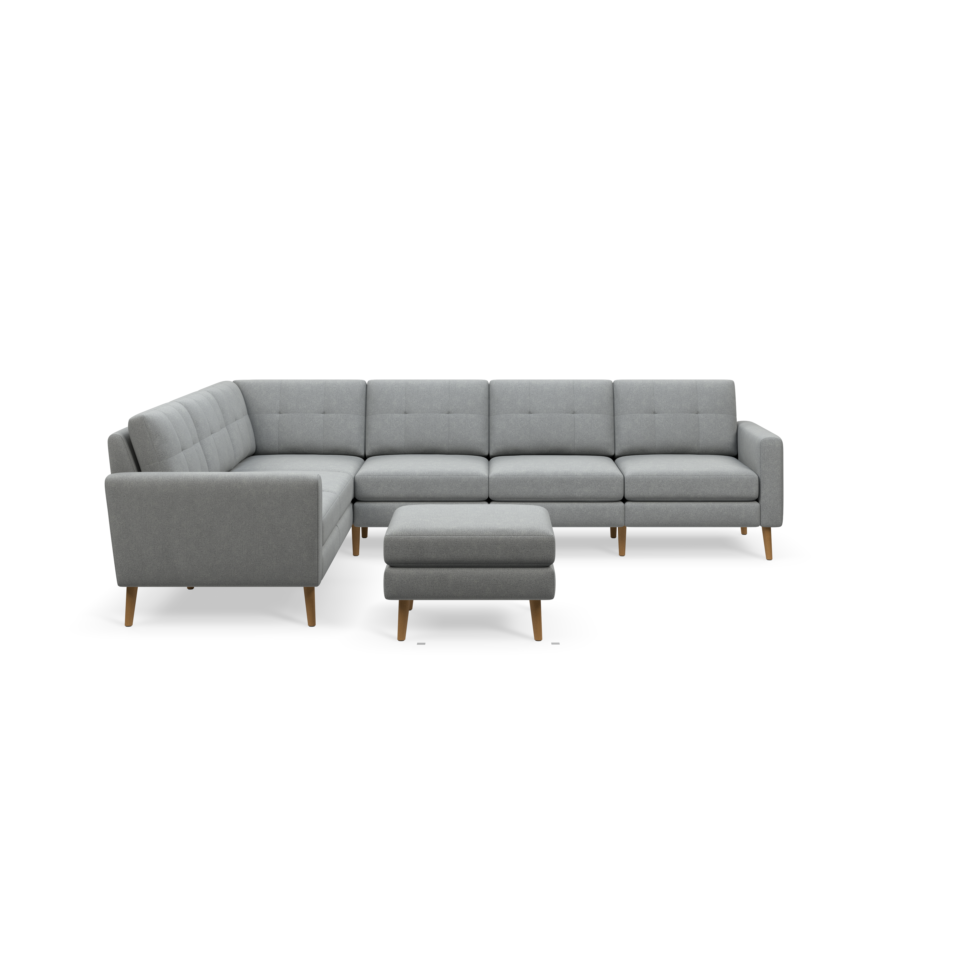 Modern light gray fabric L-shaped sectional sofa with button-tufted cushions and wooden legs, accompanied by a matching ottoman.