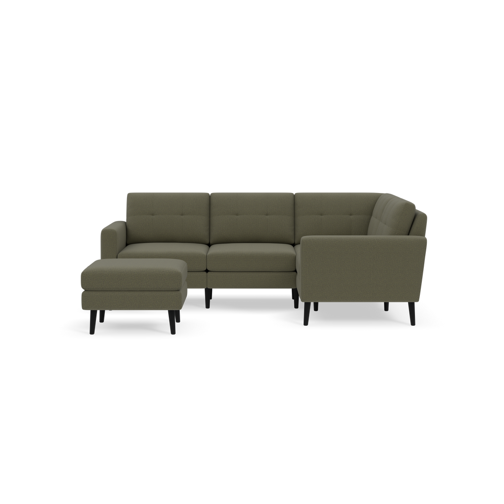 Modern olive green fabric sectional sofa with tufted cushions and black wooden legs, accompanied by a matching cushioned ottoman.