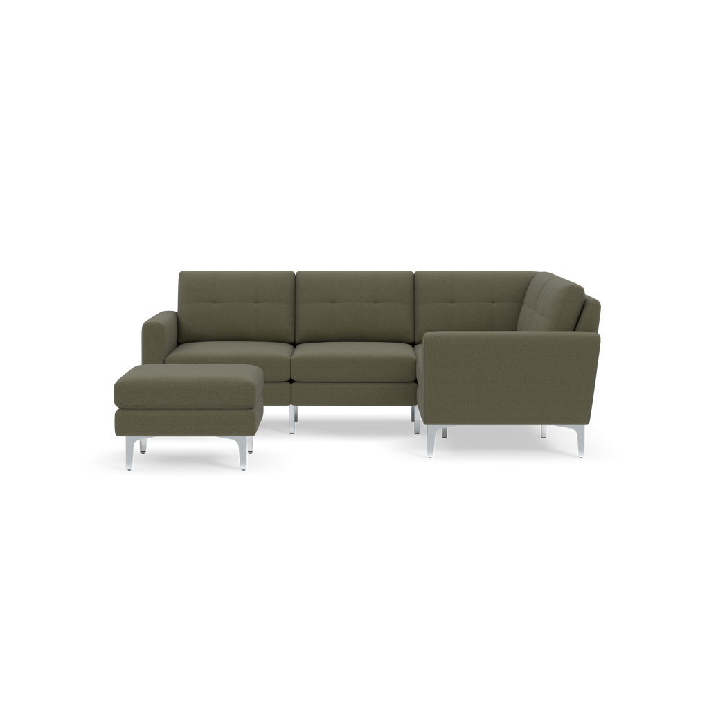 L-shaped olive green sectional sofa with tufted cushions and matching ottoman, featuring sleek silver metal legs.