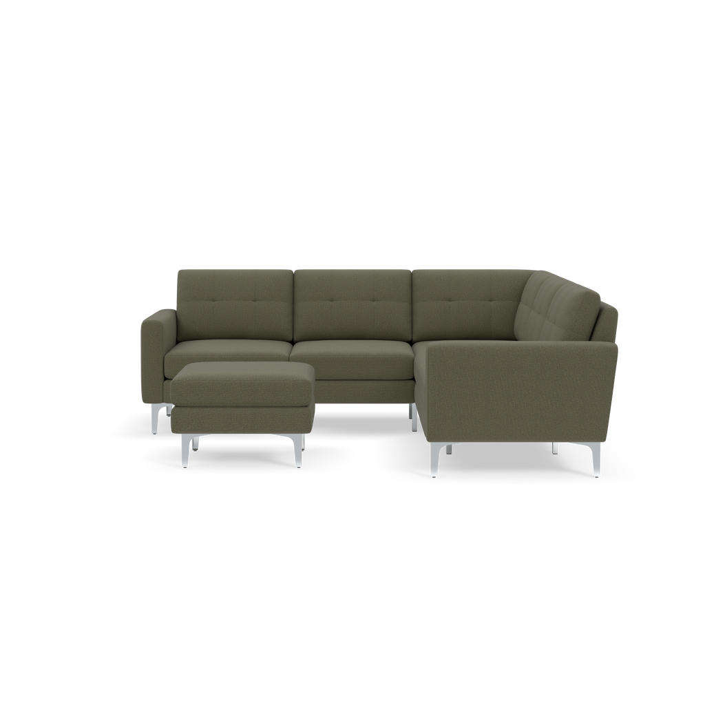 Modern olive green fabric sectional sofa with metal legs, including a matching ottoman, centered on black background.