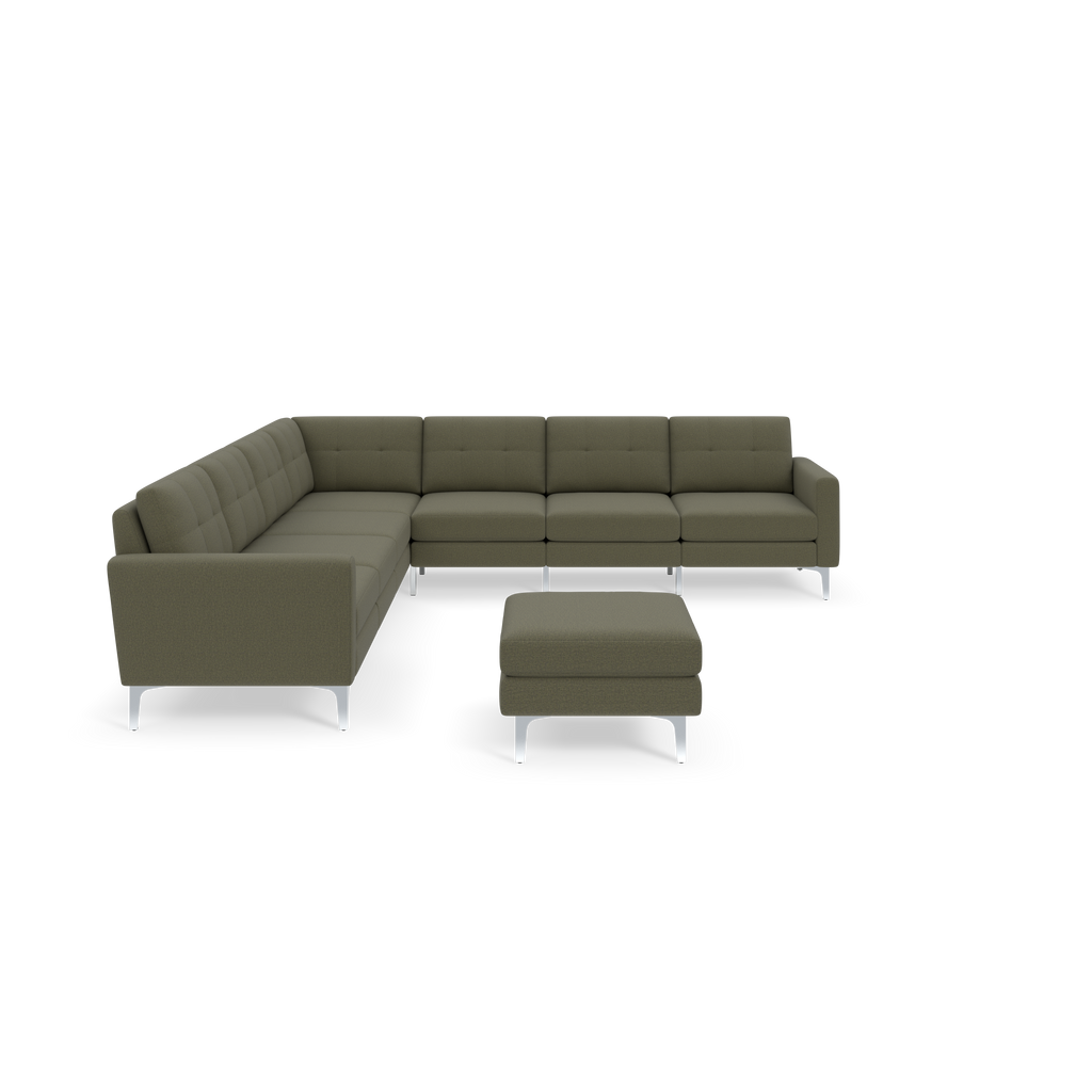 L-shaped Moss green fabric sectional sofa with tufted cushions and matching ottoman on silver metal legs.