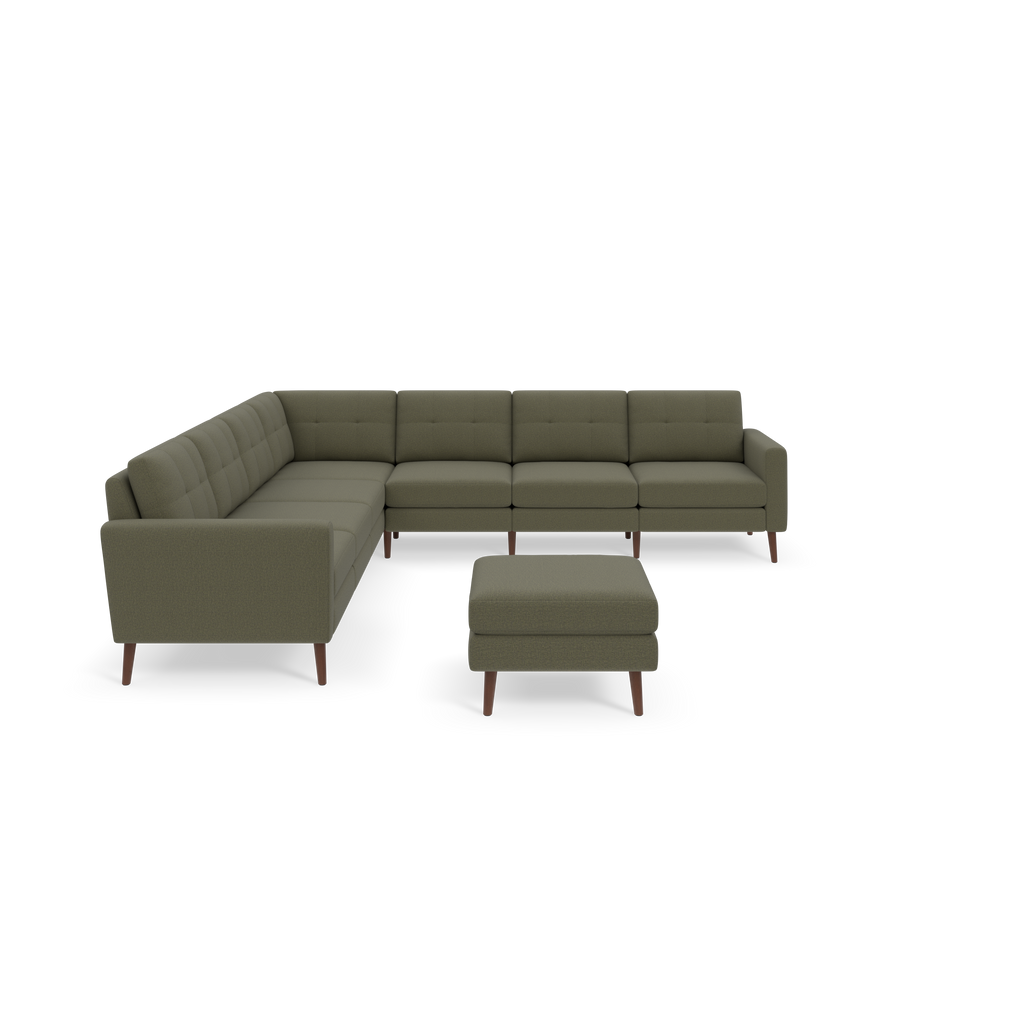 L-shaped Moss green sectional sofa with tufted cushions and wooden legs, accompanied by a matching ottoman.
