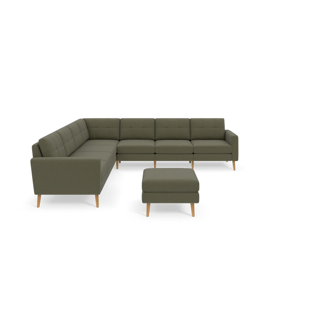 L-shaped sectional sofa with Moss green fabric upholstery and wooden legs, accompanied by a matching ottoman.